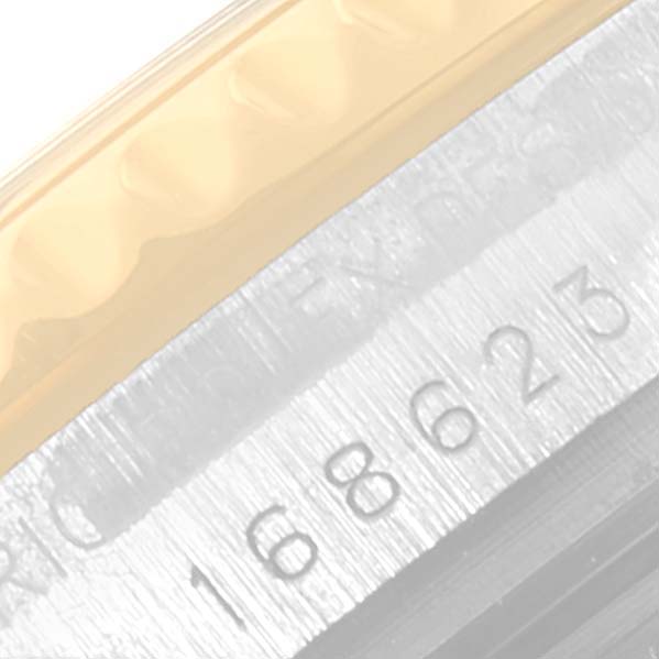 This is a close-up image showing the model number engraving on the side case of the Rolex Yacht-Master 68623 Men
s Steel and Gold (two tone) Champagne Dial 68623 Men
s Steel and Gold (two tone) Champagne Dial watch.