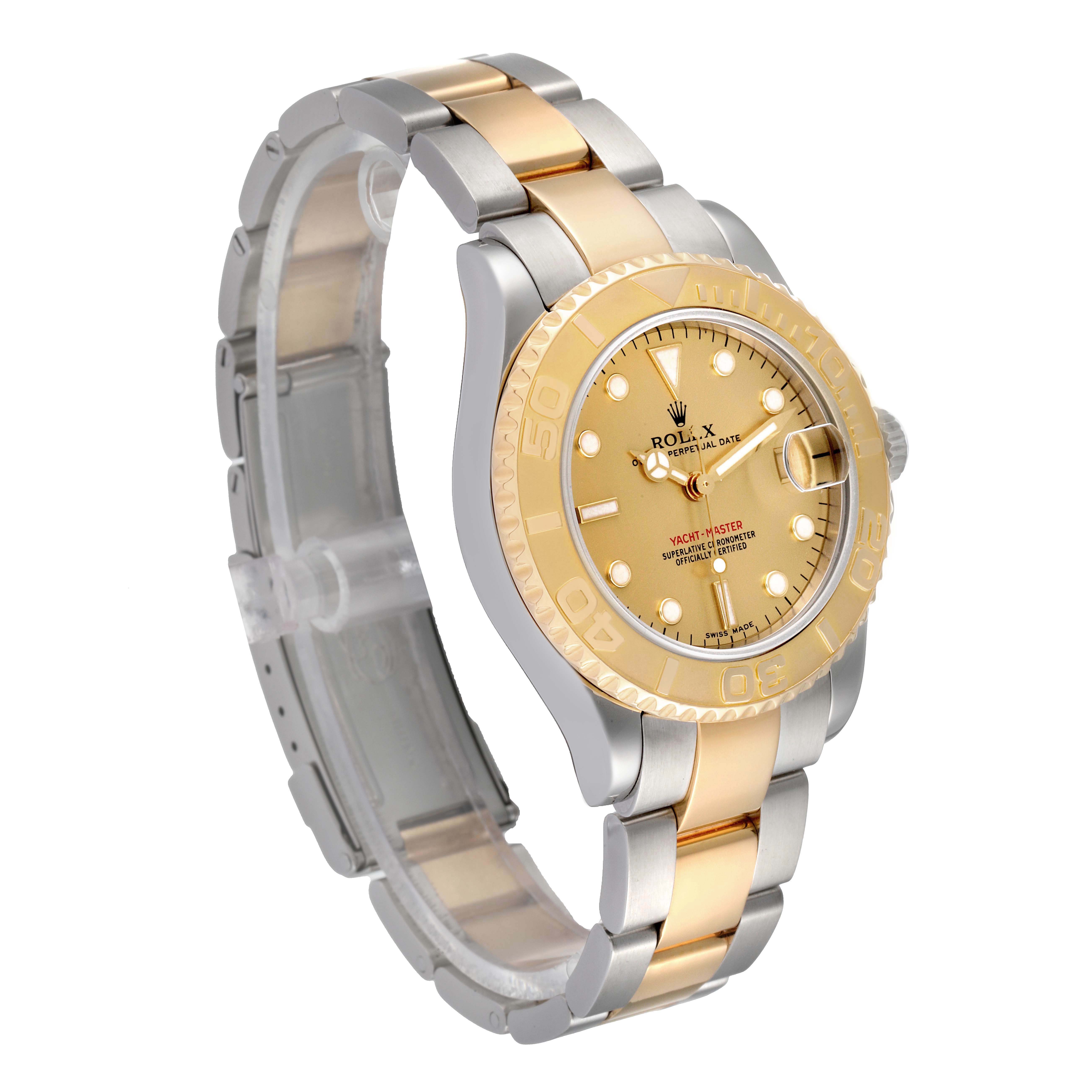 The image shows a Rolex Yacht-Master 68623 Men
s Steel and Gold (two tone) Champagne Dial 68623 Men
s Steel and Gold (two tone) Champagne Dial watch from a three-quarter angle, highlighting its two-toned bracelet and golden dial.