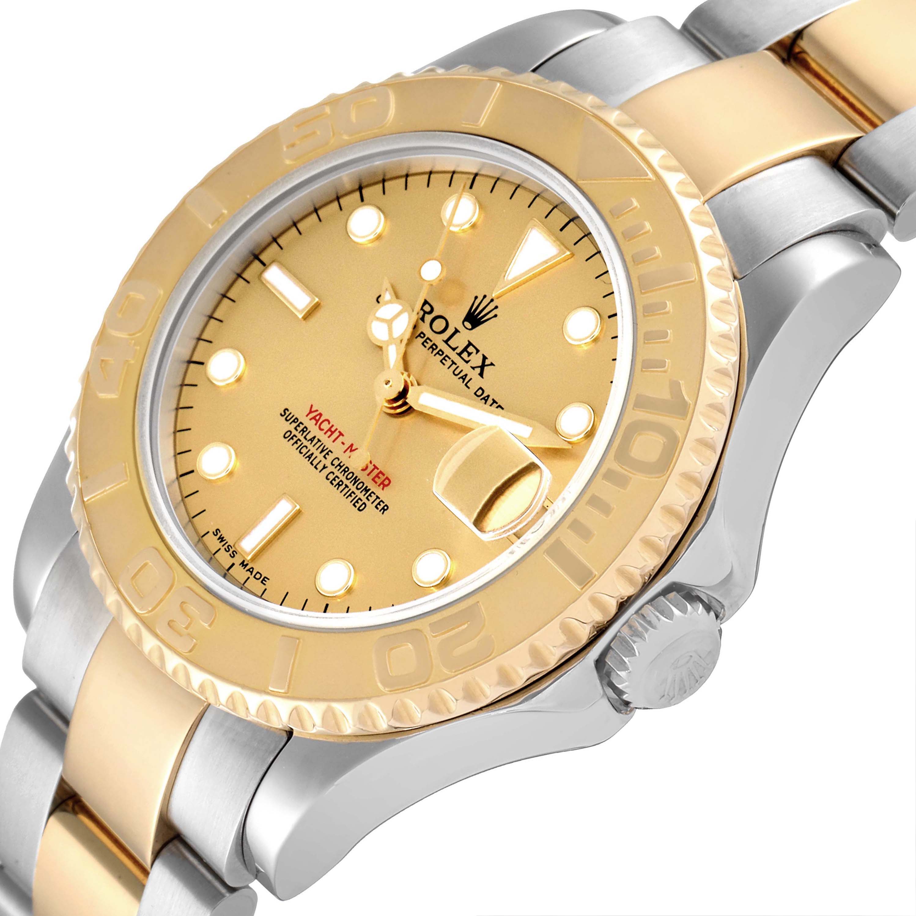 The image shows a gold and silver Rolex Yacht-Master 68623 Men
s Steel and Gold (two tone) Champagne Dial 68623 Men
s Steel and Gold (two tone) Champagne Dial watch at a slightly tilted angle, highlighting its dial, bezel, and bracelet.