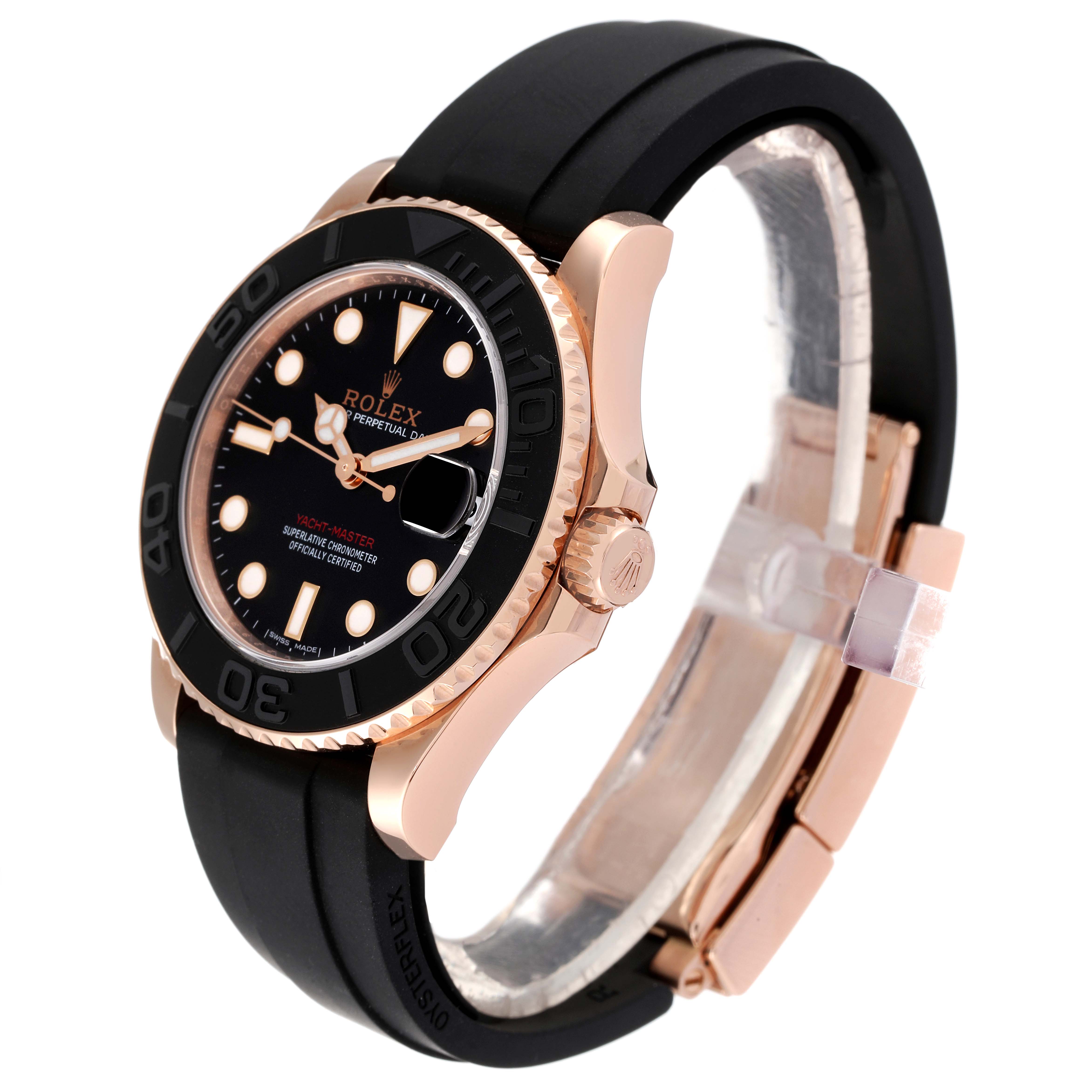 The Rolex Yacht-Master 268655 Men's Rose Gold Black Dial 268655 Men's Rose Gold Black Dial watch is shown at an angle displaying its face, bezel, crown, and black rubber strap.