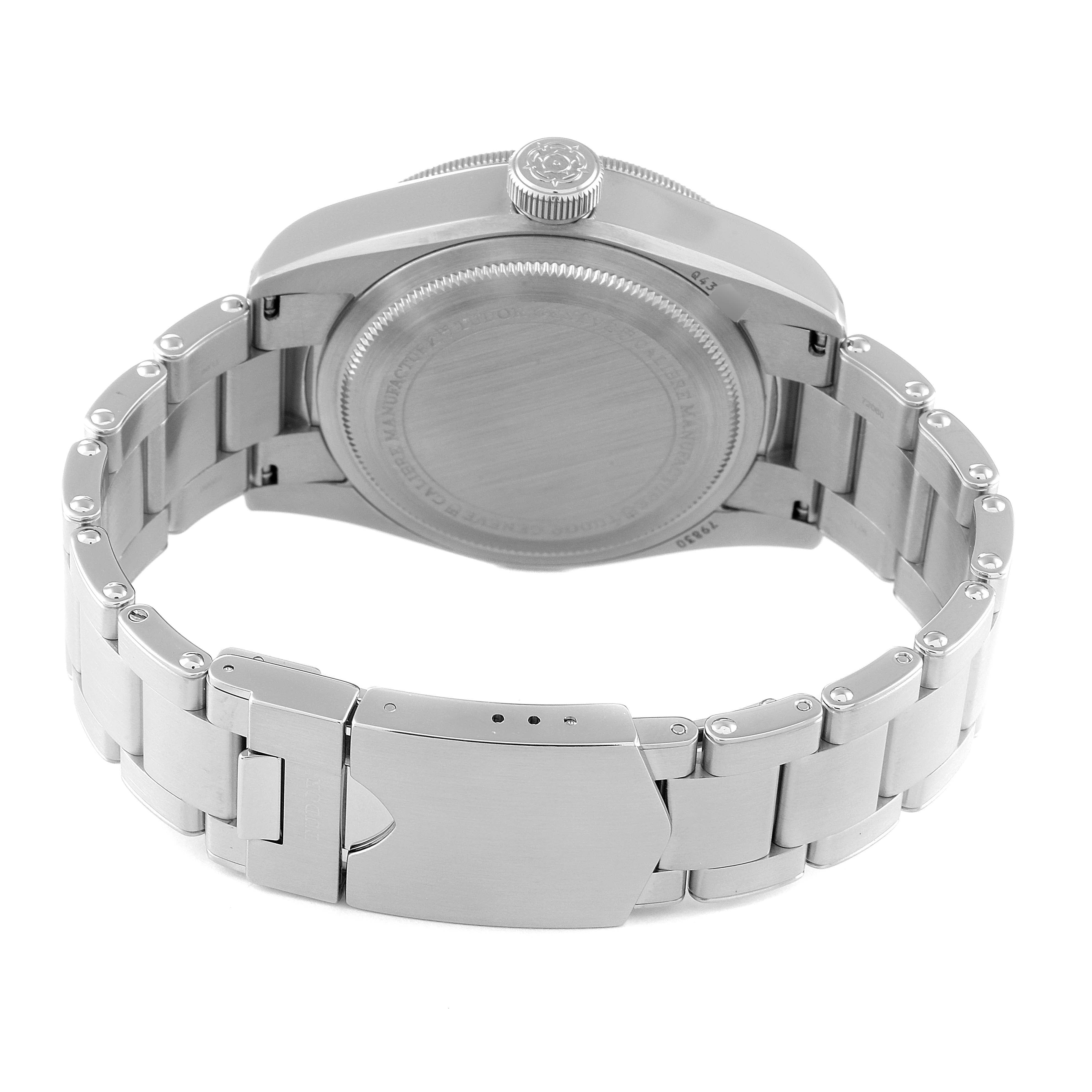 The image shows the back and bracelet of a Tudor Heritage Black Bay 79830RB Men's Stainless Steel Black Dial 79830RB Men's Stainless Steel Black Dial watch, emphasizing the clasp and case back.