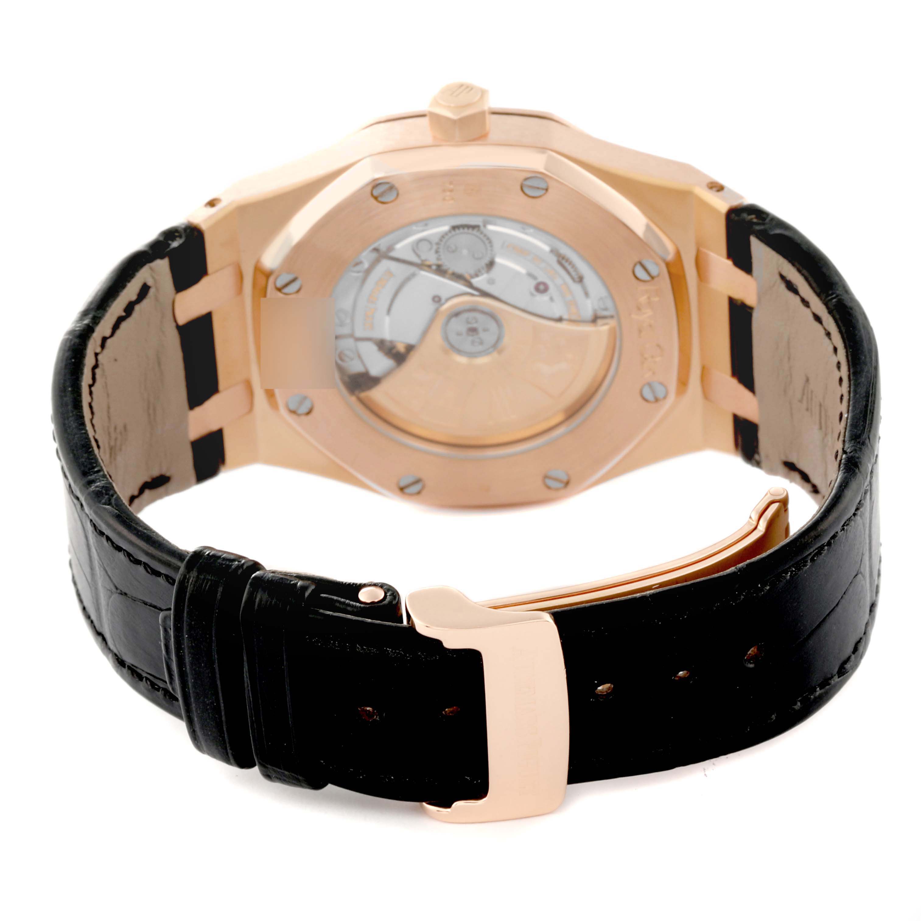 This is a rear view of an Audemars Piguet Royal Oak 15300OR.OO.D088CR.02 Men's Rose Gold Silver Dial 15300OR.OO.D088CR.02 Men's Rose Gold Silver Dial watch, showing the case back, movement, and part of the leather strap.