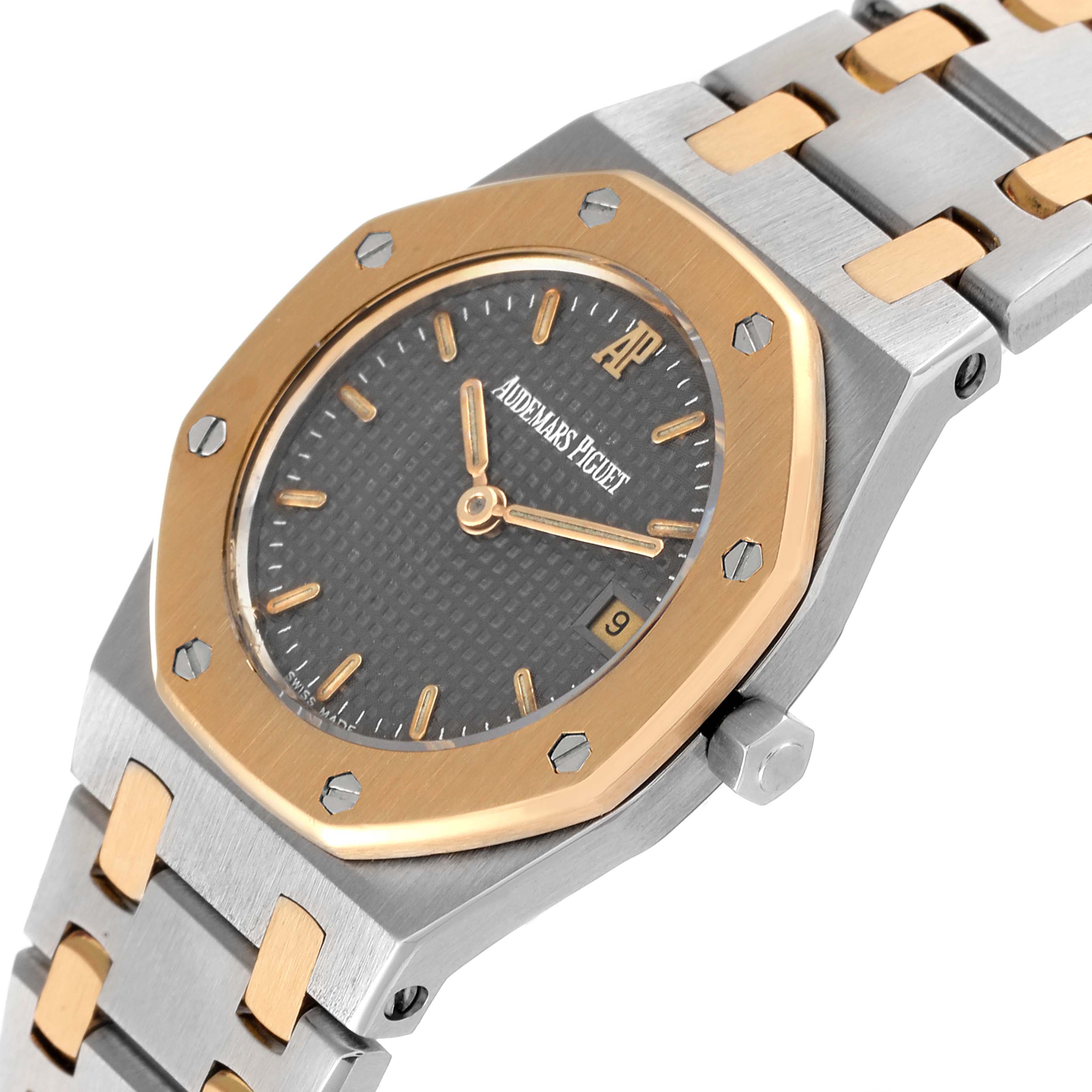 This image shows an Audemars Piguet Royal Oak Women's Steel and Gold (two tone) Grey Dial Women's Steel and Gold (two tone) Grey Dial watch from an angled view, highlighting the dial, octagonal bezel, and bracelet.