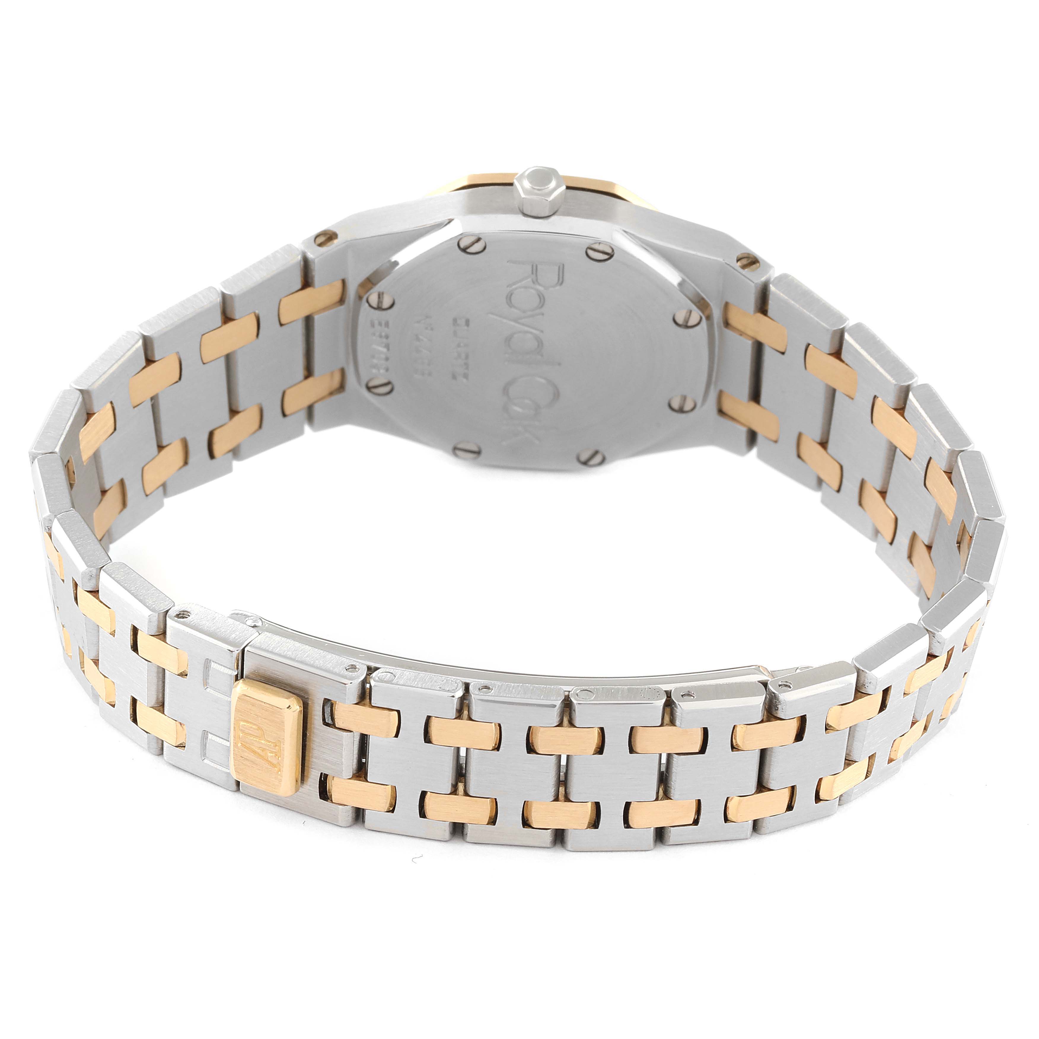 The image shows the back view of the Audemars Piguet Royal Oak Women's Steel and Gold (two tone) Grey Dial Women's Steel and Gold (two tone) Grey Dial watch, highlighting the case back and part of the bracelet.