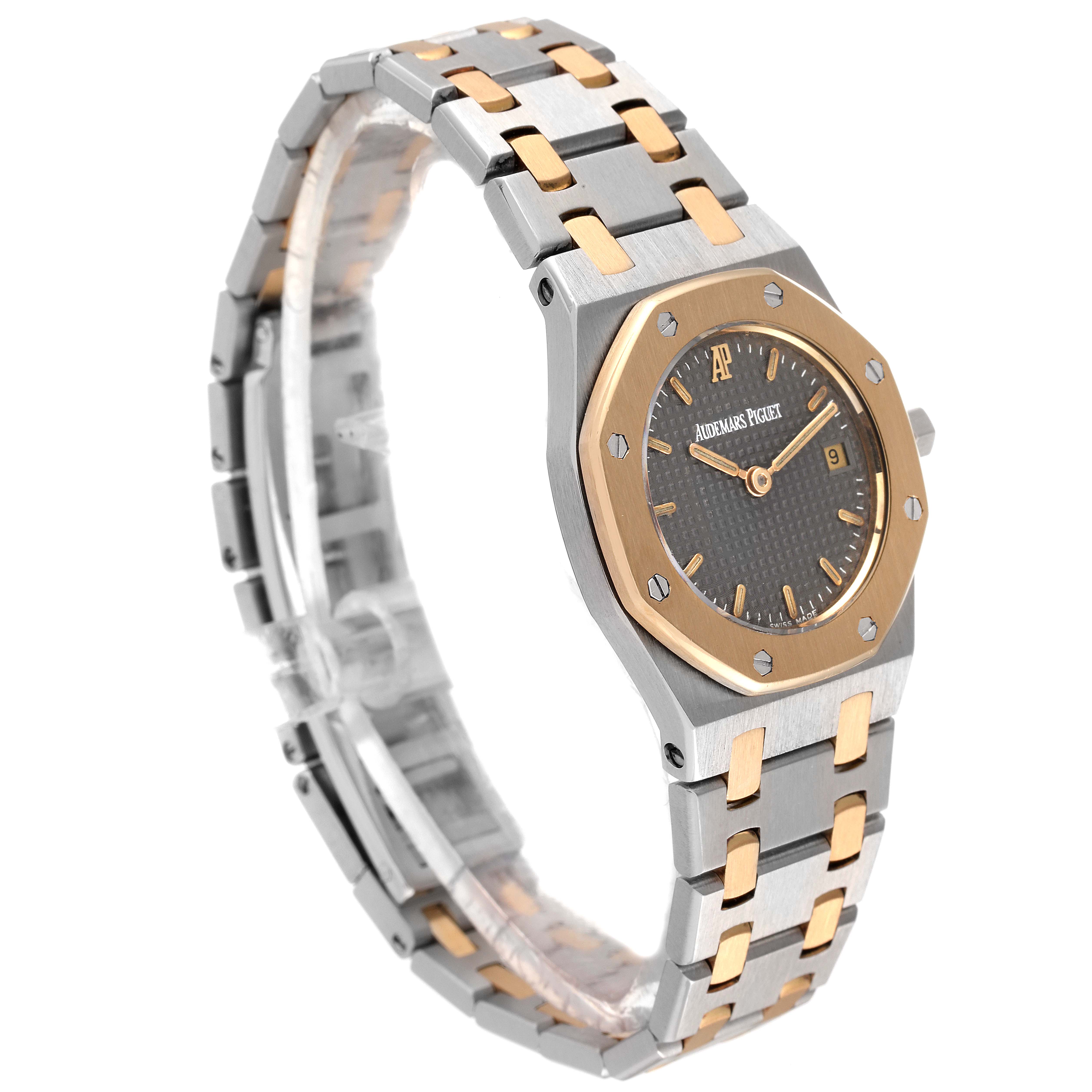 This image shows a Royal Oak model by Audemars Piguet, displayed at a three-quarter angle, highlighting the face and bracelet.