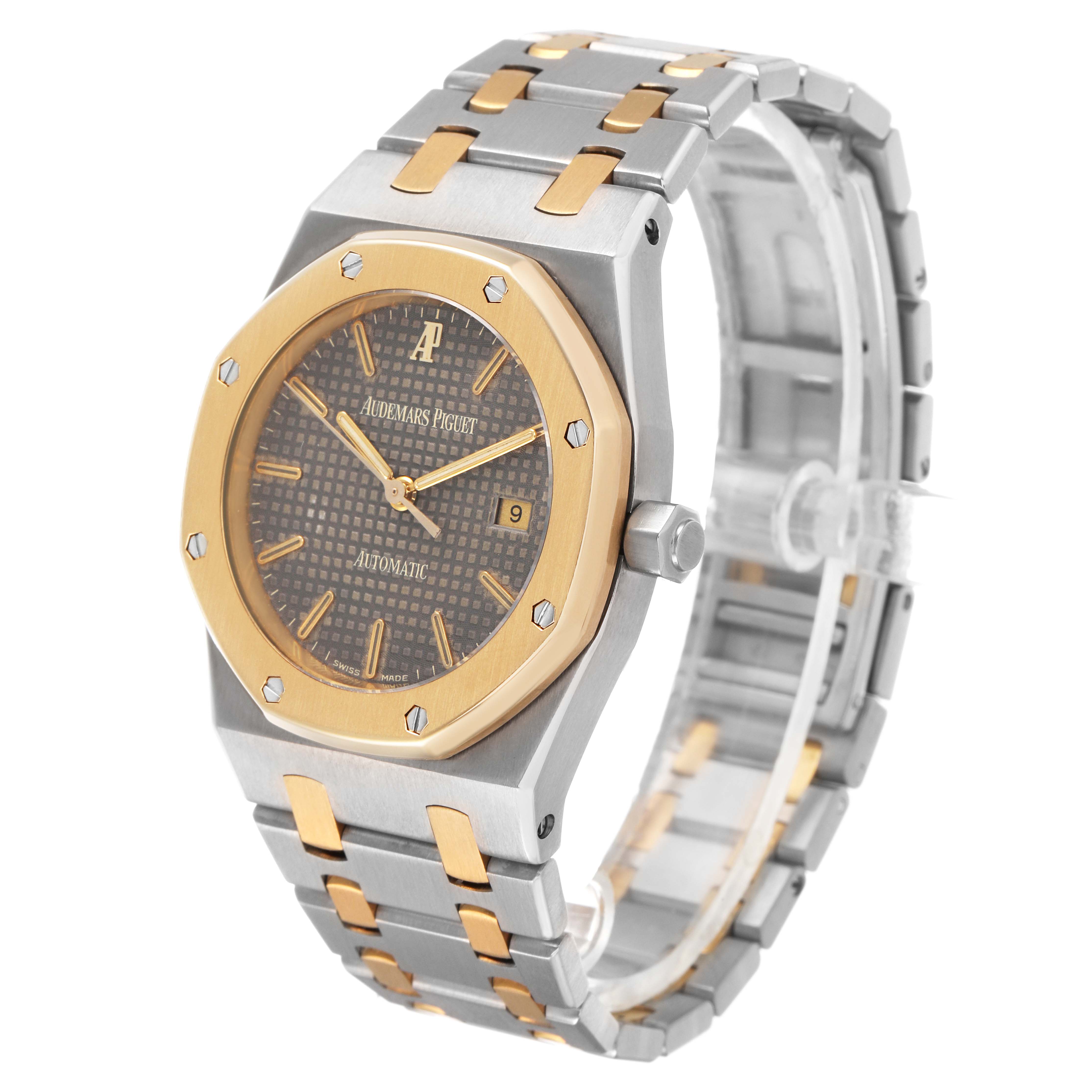The Audemars Piguet Royal Oak 15000SA Men's Steel and Gold (two tone) Grey Dial watch is shown at a three-quarter angle, featuring the case, bezel, dial, and bracelet.