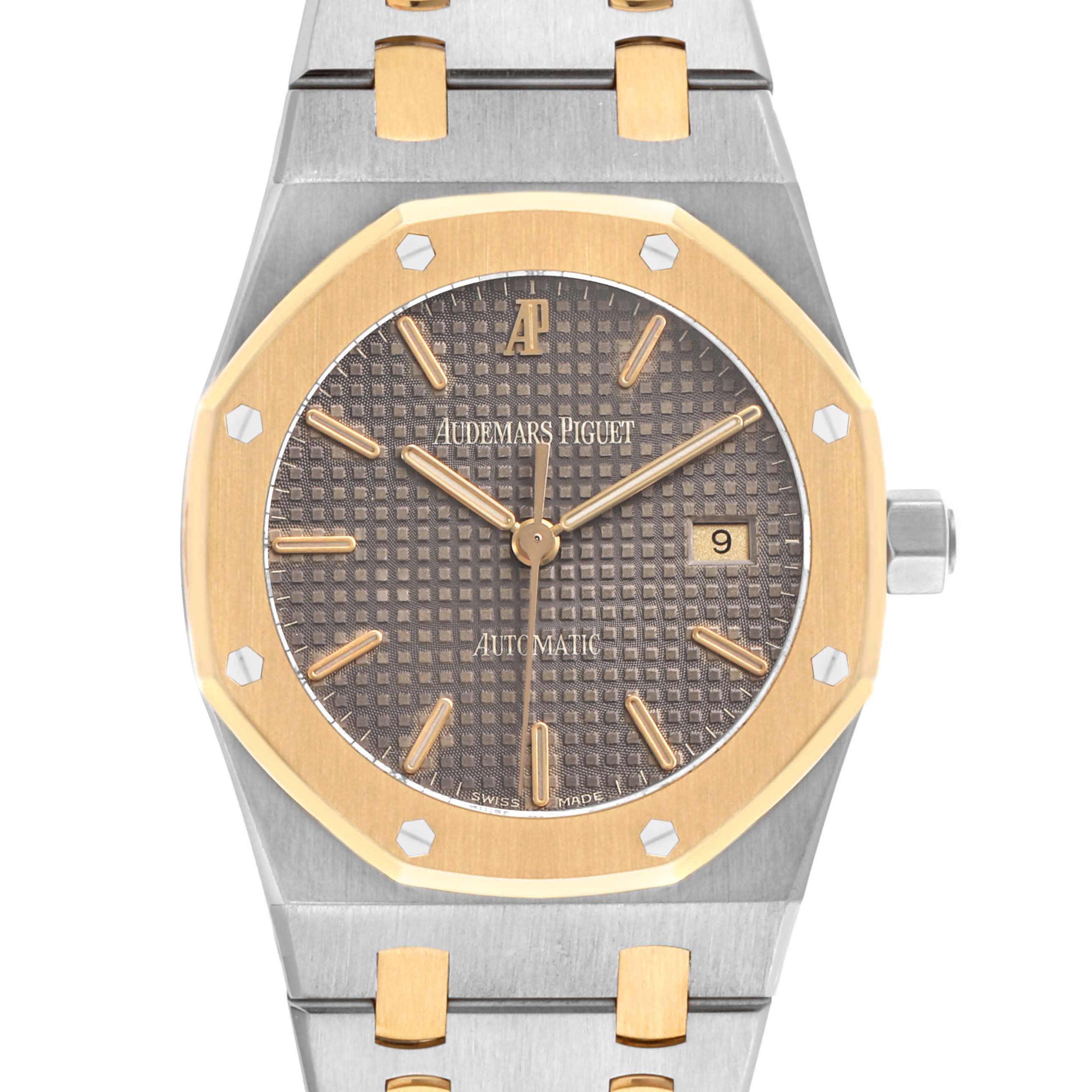 The image shows a frontal view of the Audemars Piguet Royal Oak 15000SA Men's Steel and Gold (two tone) Grey Dial watch, highlighting the bezel, dial, and bracelet.