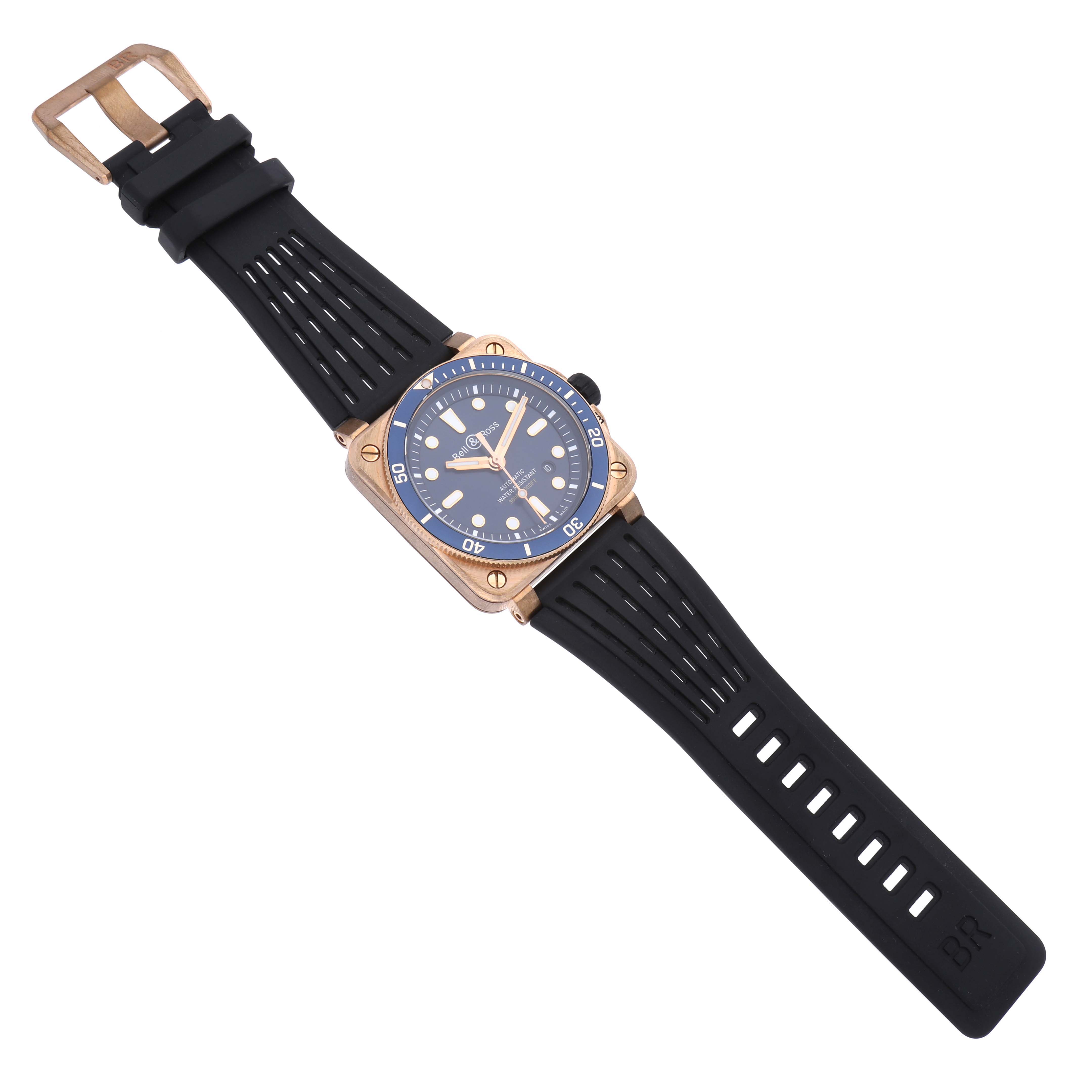 The image shows a Bell & Ross Instruments BR0392-D-LU-BR/SCA Men's Bronze Blue Dial BR0392-D-LU-BR/SCA Men's Bronze Blue Dial watch with a blue dial and black rubber strap, viewed from above.