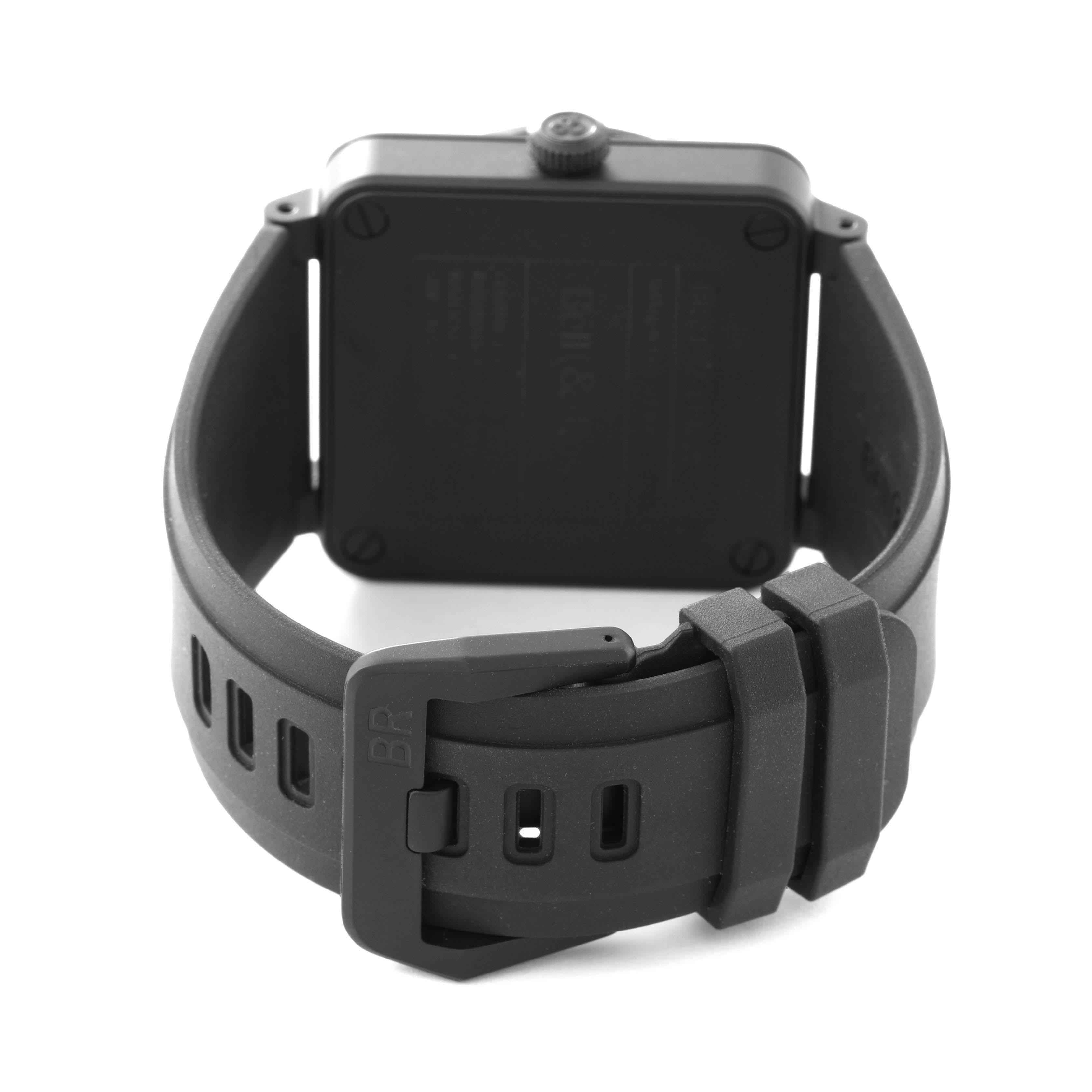 This Bell 
Ross Instruments BR0392-RCO-CE/SRB Men
s Ceramic Black Dial BR0392-RCO-CE/SRB Men
s Ceramic Black Dial model watch is shown from a rear angle, highlighting the back case and rubber strap with its buckle.