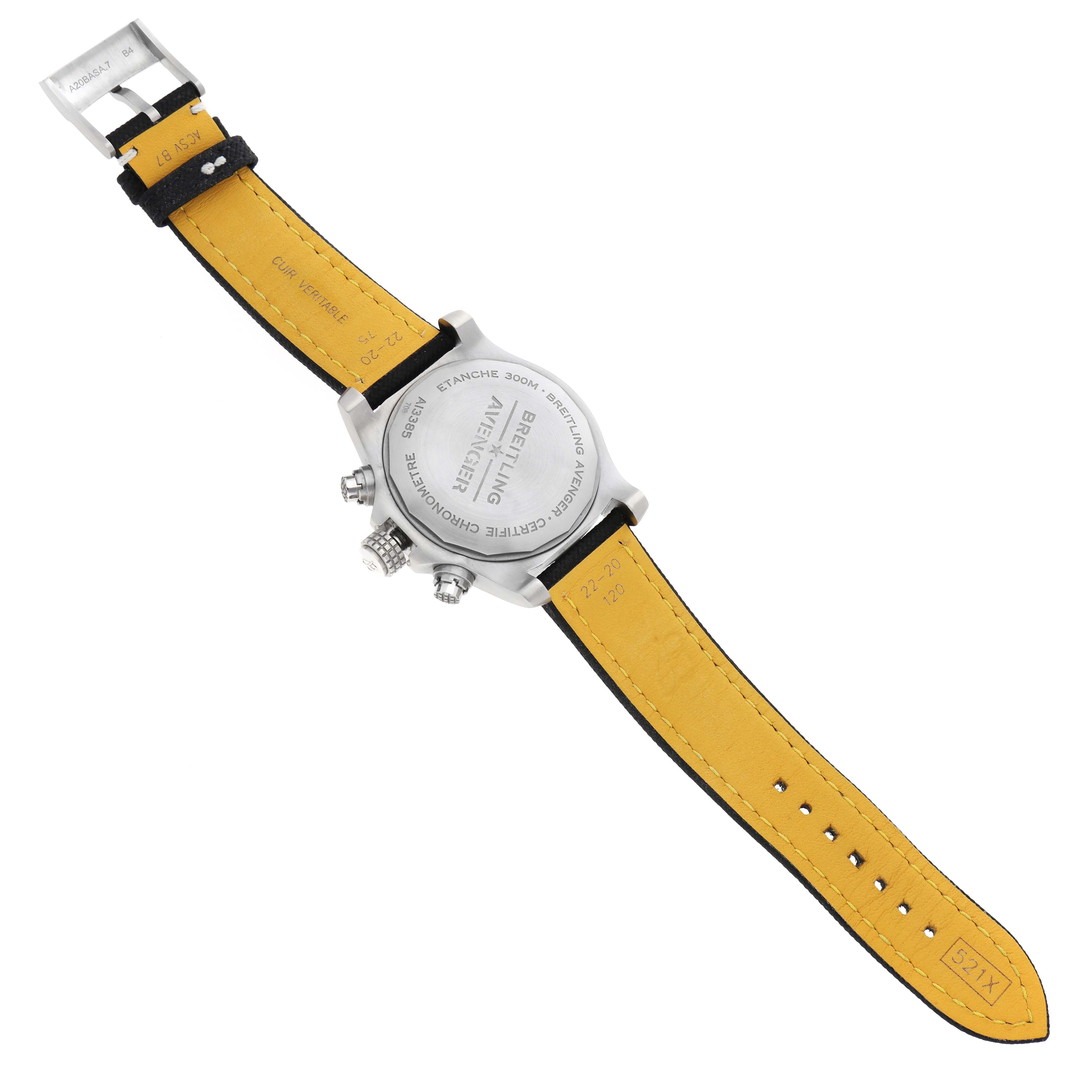 The image shows the back and band of a Breitling Avenger A13385 Men's Stainless Steel Black Dial A13385 Men's Stainless Steel Black Dial watch, highlighting its case back engravings and yellow inner strap.