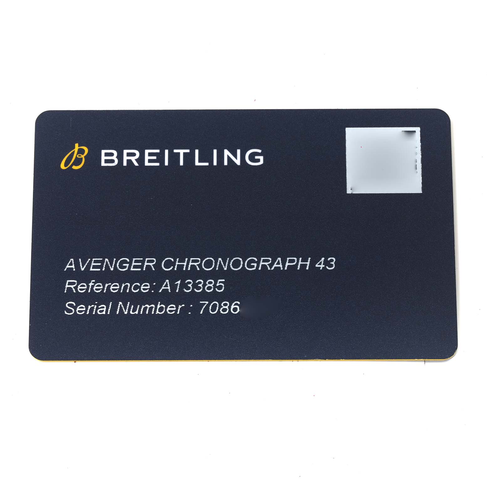 This image shows the warranty card for the Breitling Avenger A13385 Men's Stainless Steel Black Dial A13385 Men's Stainless Steel Black Dial Chronograph 43 watch, displaying its reference and serial number.