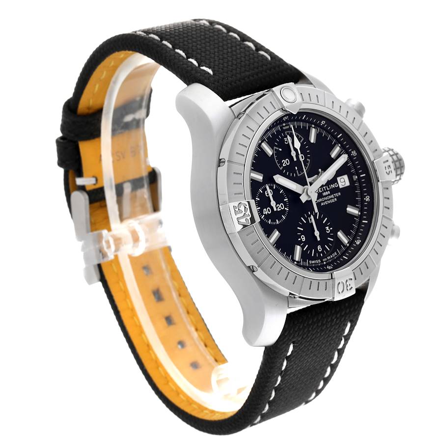 The image shows a Breitling Avenger watch at a three-quarter angle, highlighting the dial, bezel, and strap.