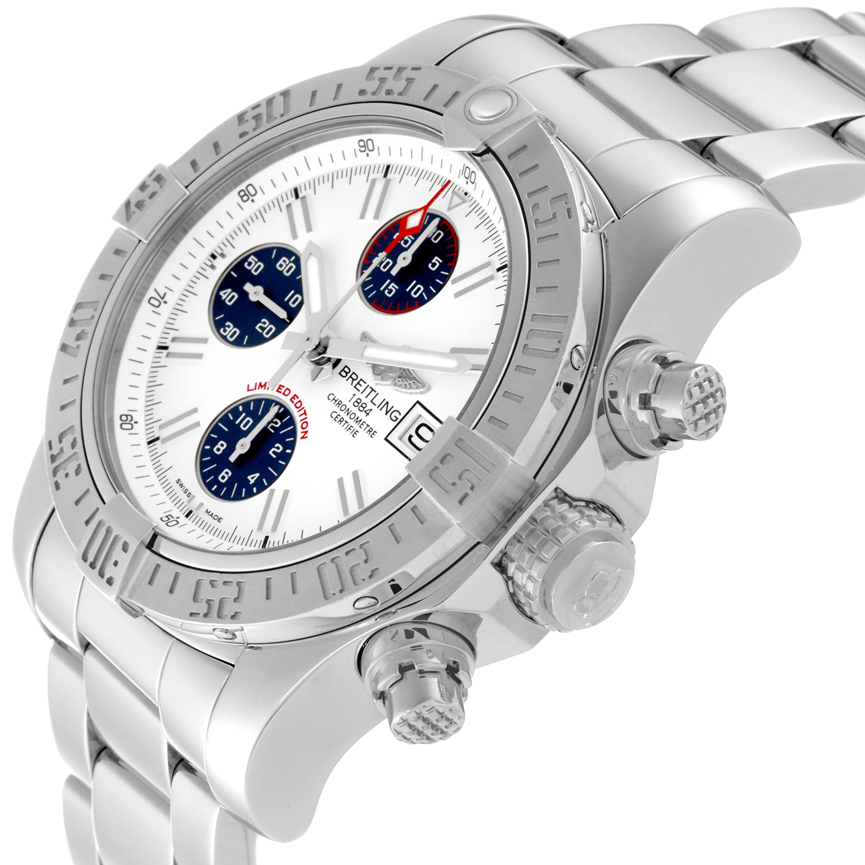 The image shows a side angle view of a Breitling Avenger A13381 Men's Stainless Steel White Dial A13381 Men's Stainless Steel White Dial watch, highlighting its bezel, crown, and chronograph pushers.