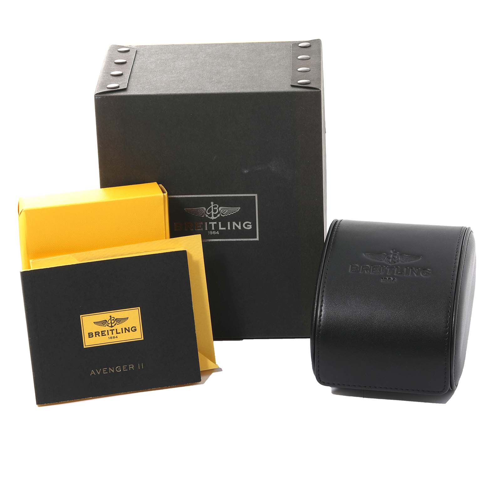 The image shows the packaging, manual, and carrying case for a Breitling Avenger A13381 Men's Stainless Steel White Dial A13381 Men's Stainless Steel White Dial model watch.