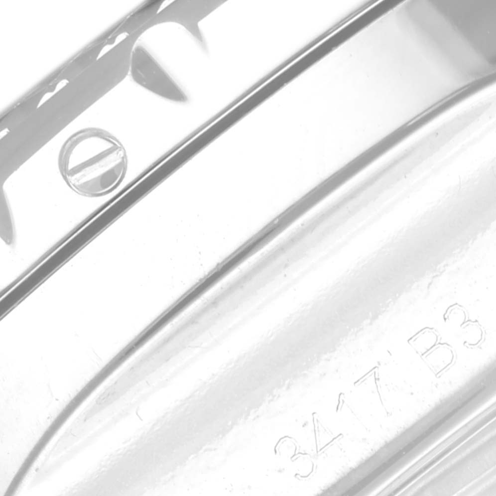 The image shows a close-up of the casing and screw of a Bentley model watch by Breitling.