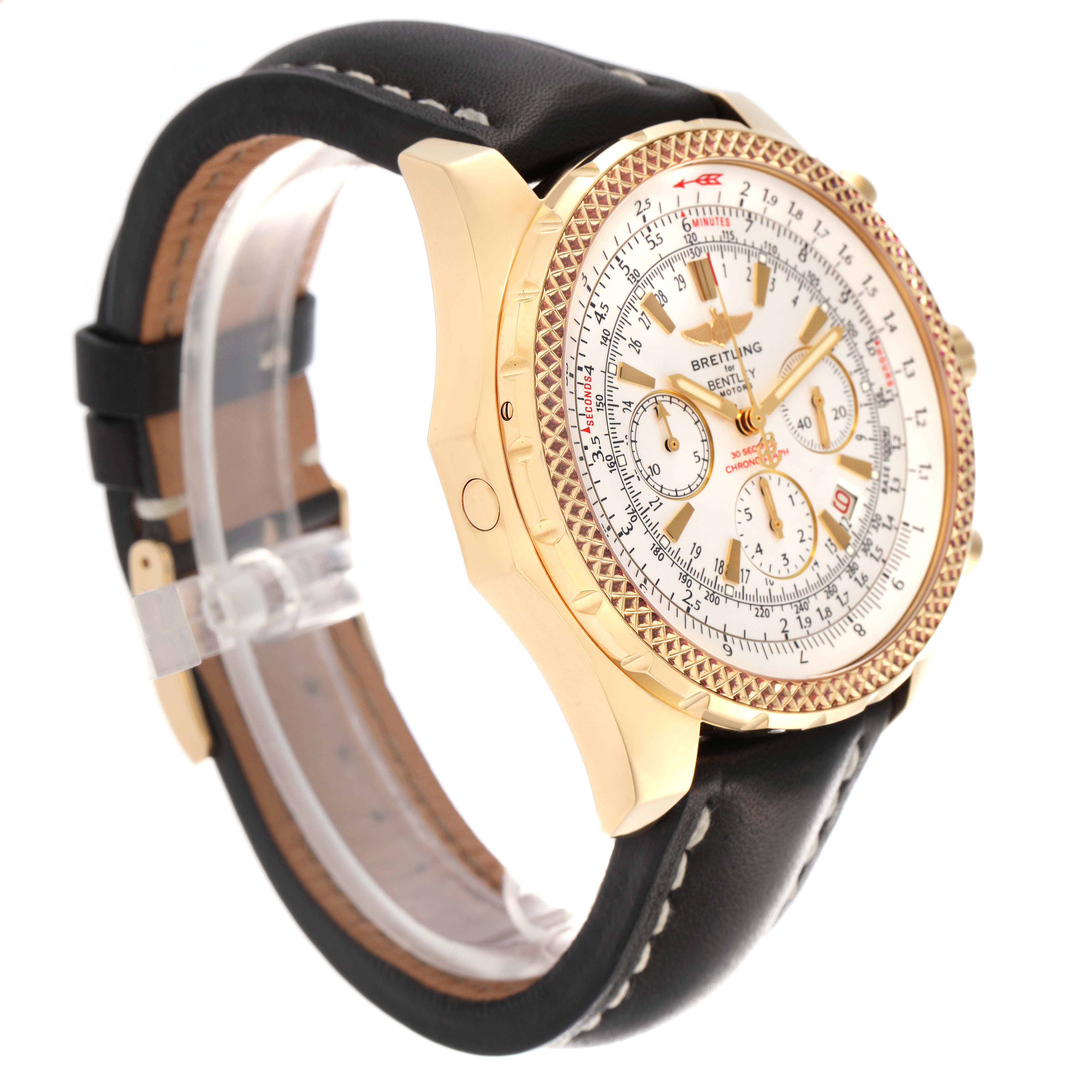 The Breitling Bentley K25362 Men's Yellow Gold White Dial K25362 Men's Yellow Gold White Dial watch is shown at a three-quarter angle, highlighting the bezel, dial, and leather strap.