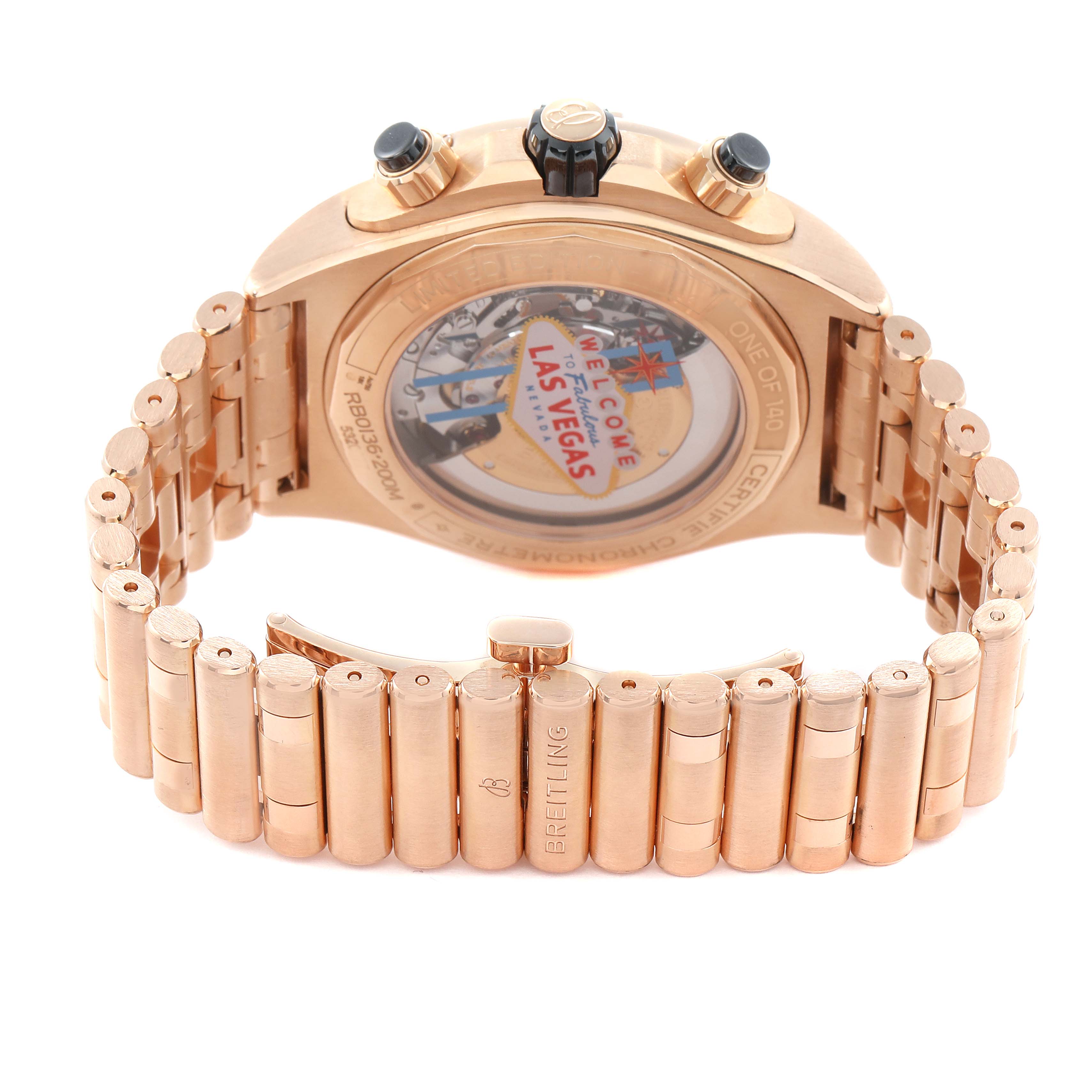 The image shows the back and bracelet of a Breitling Chronomat RB0136 Men's Rose Gold Blue Dial RB0136 Men's Rose Gold Blue Dial watch, highlighting the case back design and the deployment clasp.