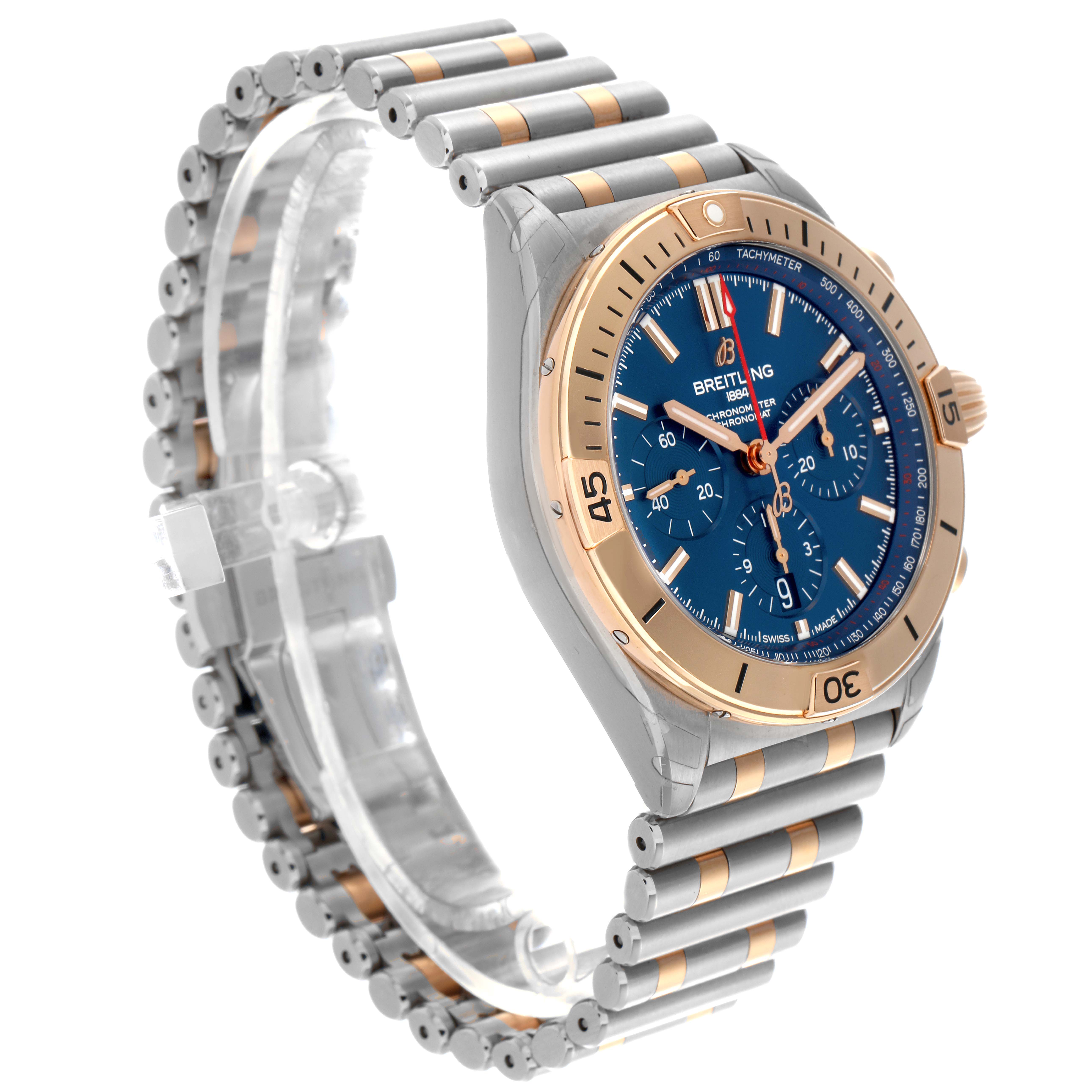 The Breitling Chronomat UB0134101C1U1 Men's Steel and Gold (two tone) Blue Dial UB0134101C1U1 Men's Steel and Gold (two tone) Blue Dial watch is shown from an angle highlighting the face, bezel, and partial bracelet.