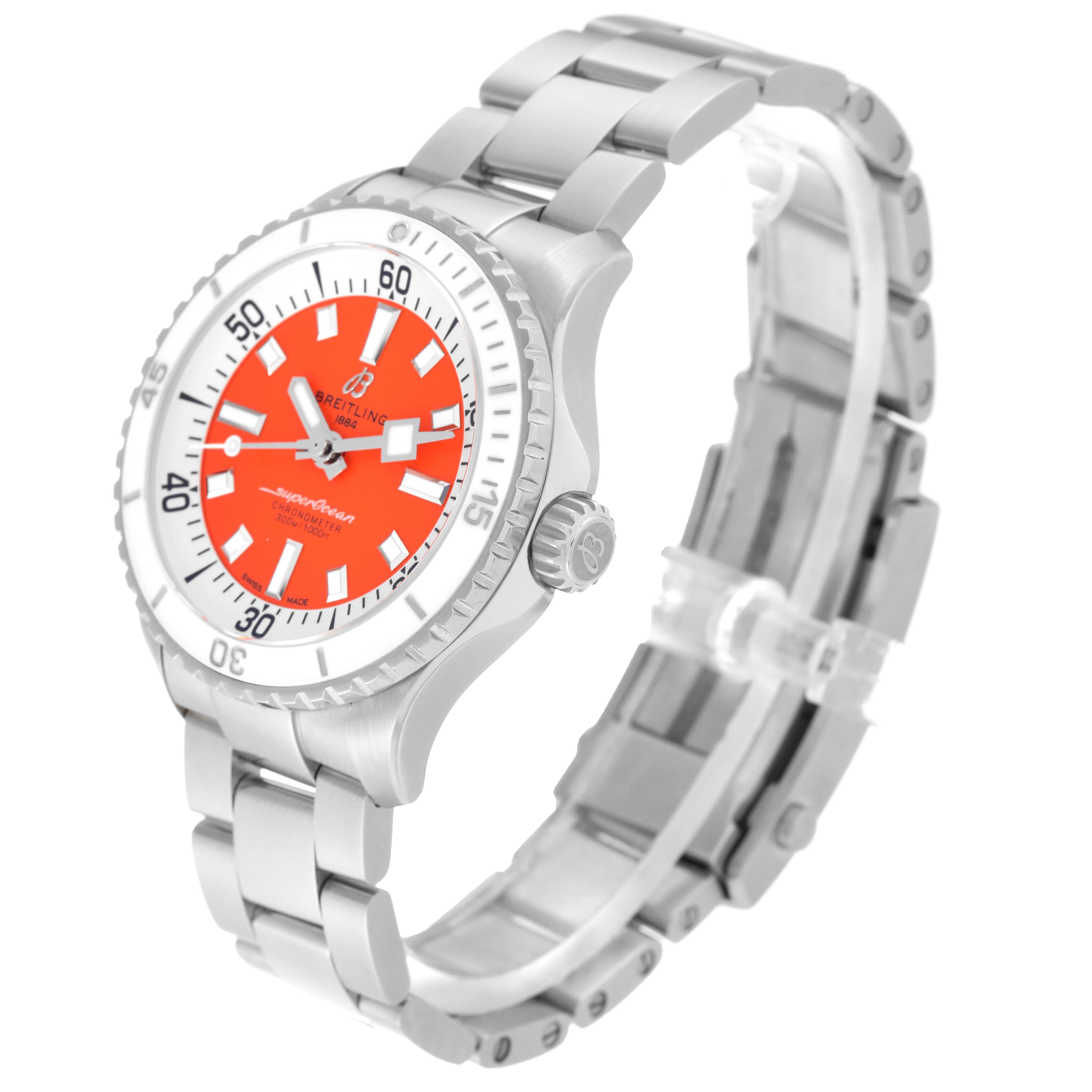 The Breitling A17377 Women's Stainless Steel Orange Dial A17377 Women's Stainless Steel Orange Dial Superocean 36 Steel A17377 watch is shown at a right-side angle, displaying the orange dial, bezel, crown, and bracelet.