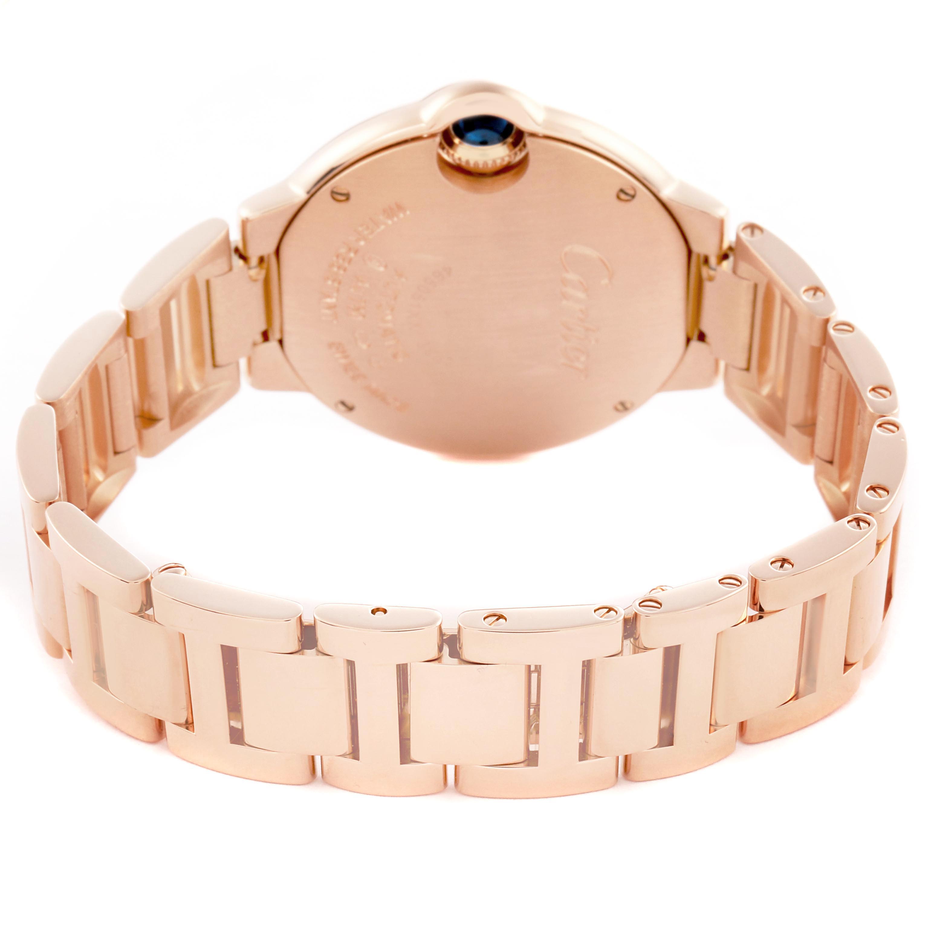 The image shows the back and bracelet of the Cartier Ballon Bleu W6920096 Women's Rose Gold Silver Dial watch, highlighting its clasp and links.