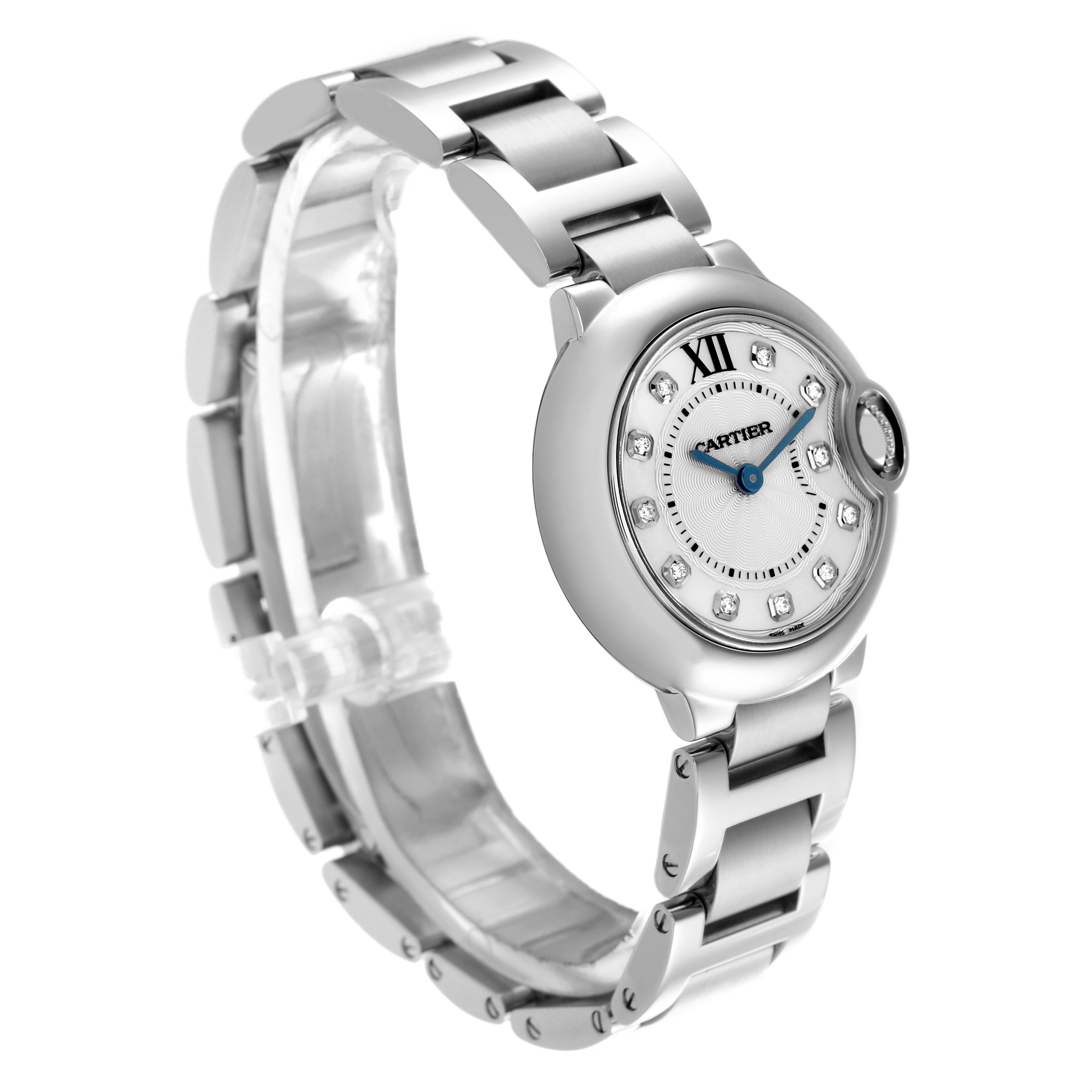 The Ballon Bleu by Cartier is shown at an angle highlighting the bracelet and the diamond-studded dial.