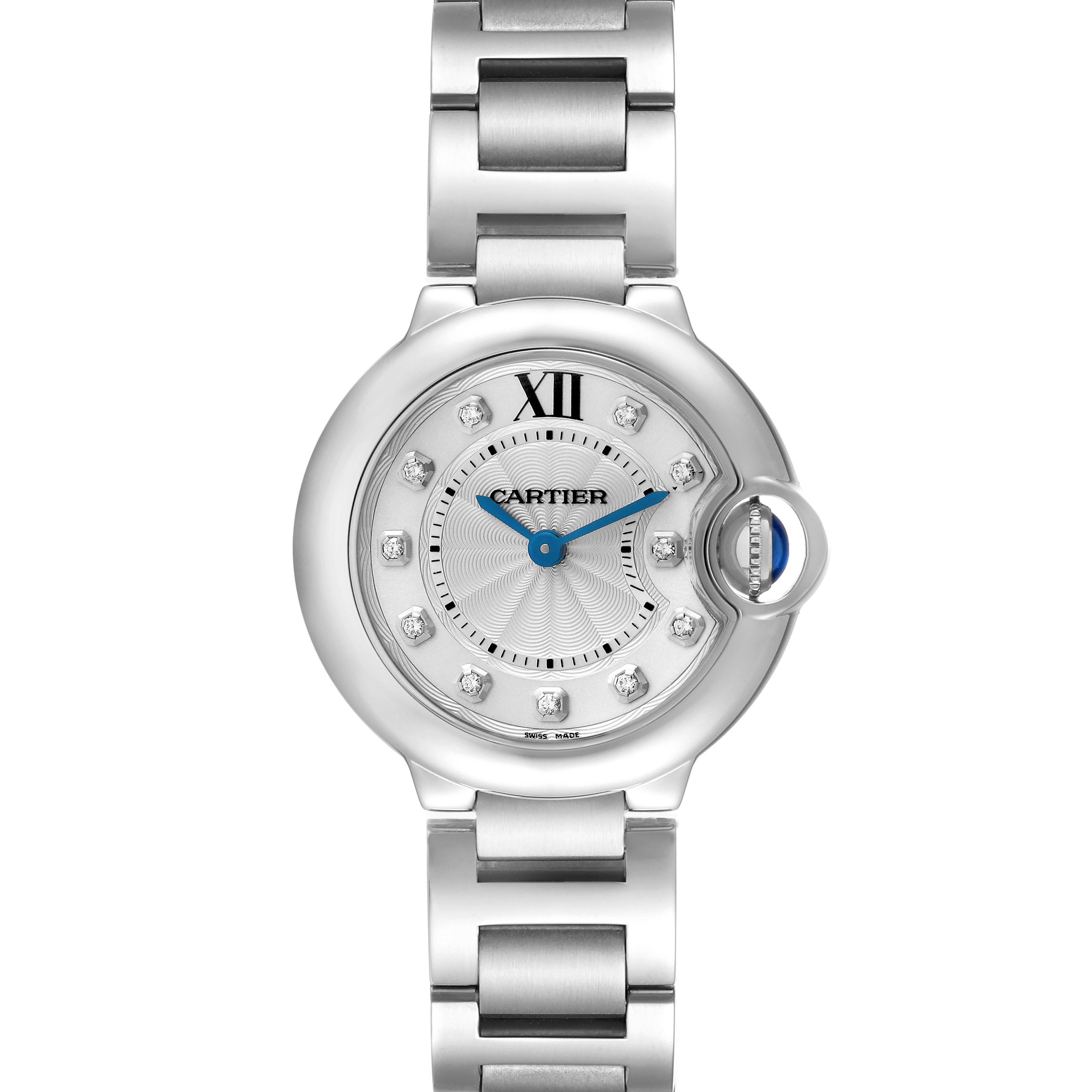The Ballon Bleu by Cartier is shown from a top-down angle, highlighting the face, bracelet, and crown with a blue cabochon.