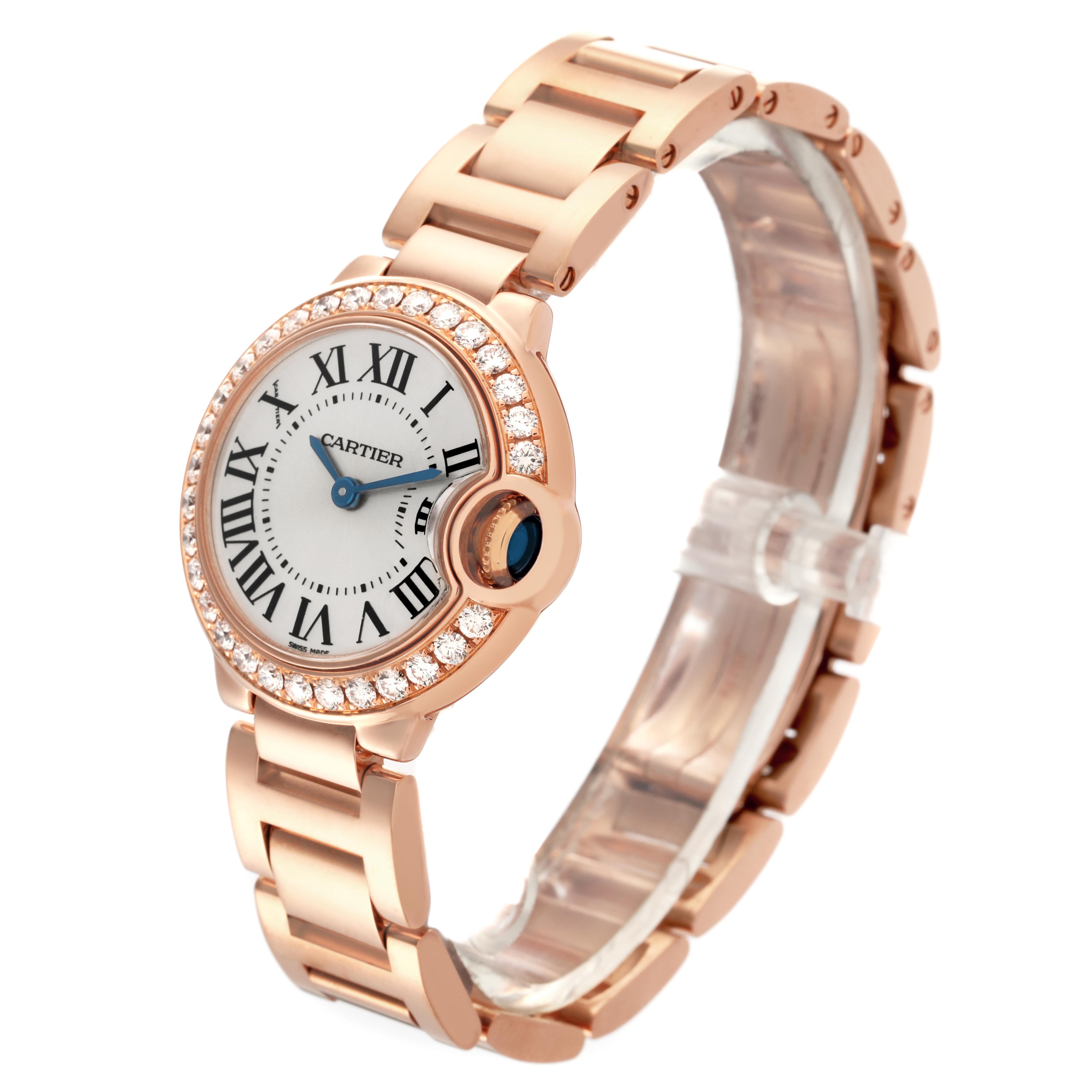 The Cartier Ballon Bleu WE9002Z3 Women's Rose Gold Silver Dial WE9002Z3 Women's Rose Gold Silver Dial watch is shown at a three-quarter angle, highlighting the face, roman numerals, and diamond-accented bezel.