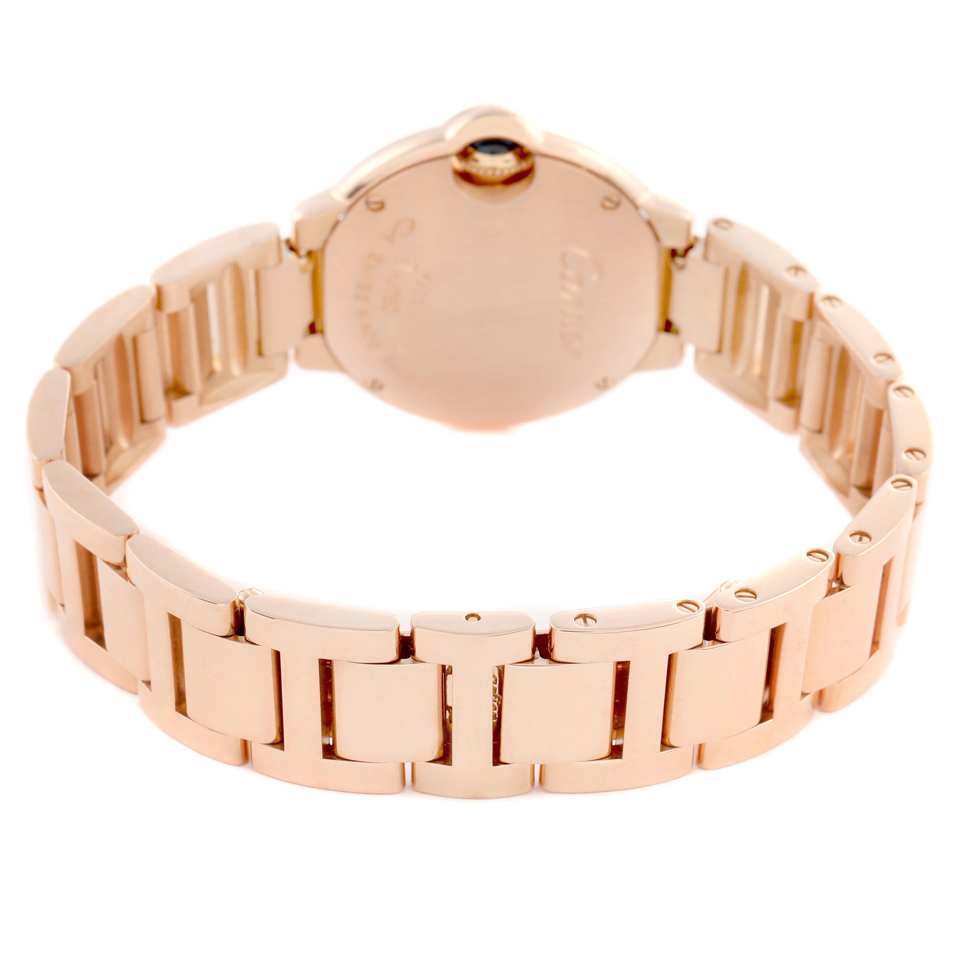 The Cartier Ballon Bleu WE9002Z3 Women's Rose Gold Silver Dial WE9002Z3 Women's Rose Gold Silver Dial watch is shown from the back, highlighting the bracelet and caseback.