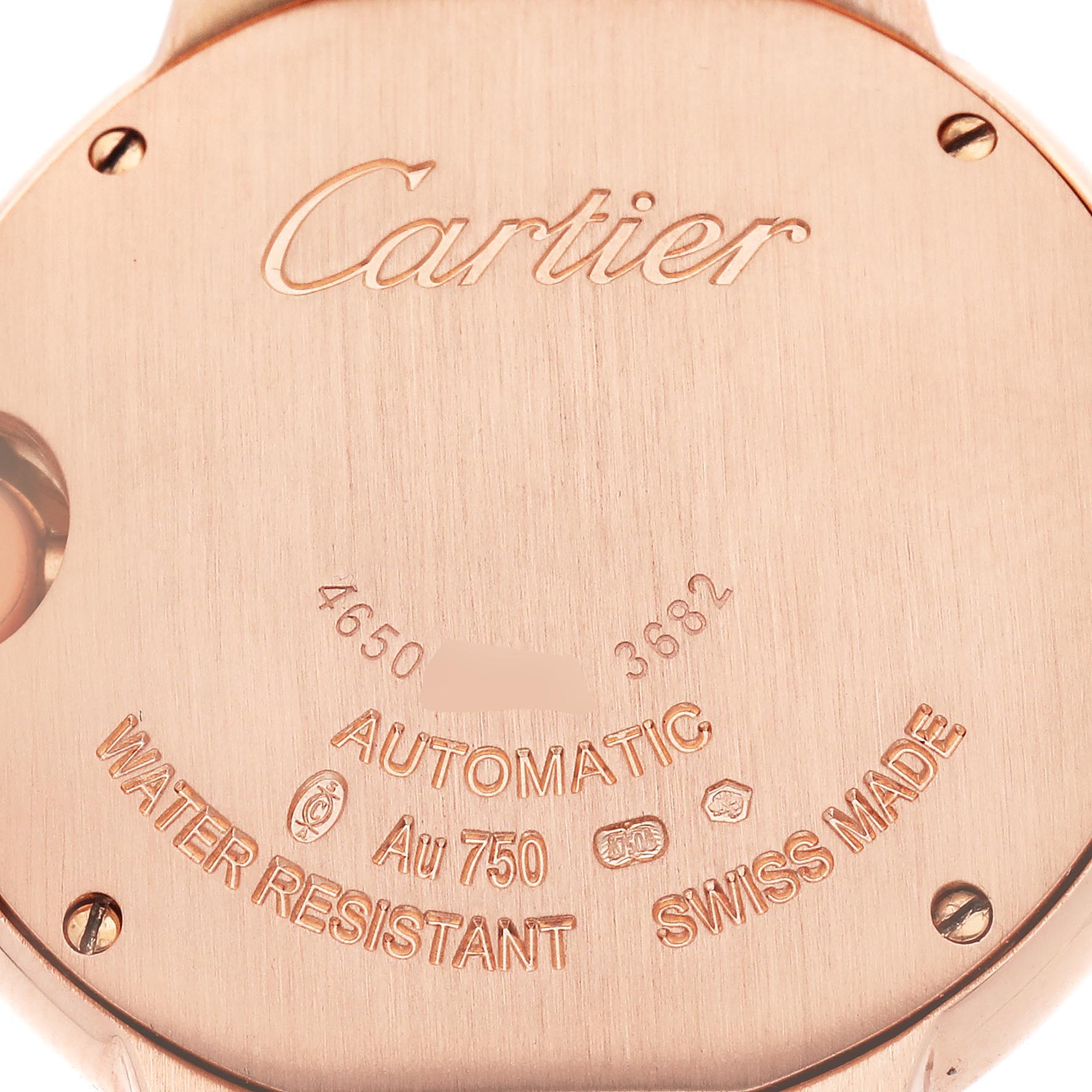 The image shows the back case of a Cartier Ballon Bleu W6920096 Women's Rose Gold Red Dial W6920096 Women's Rose Gold Red Dial watch, featuring engravings and screws.