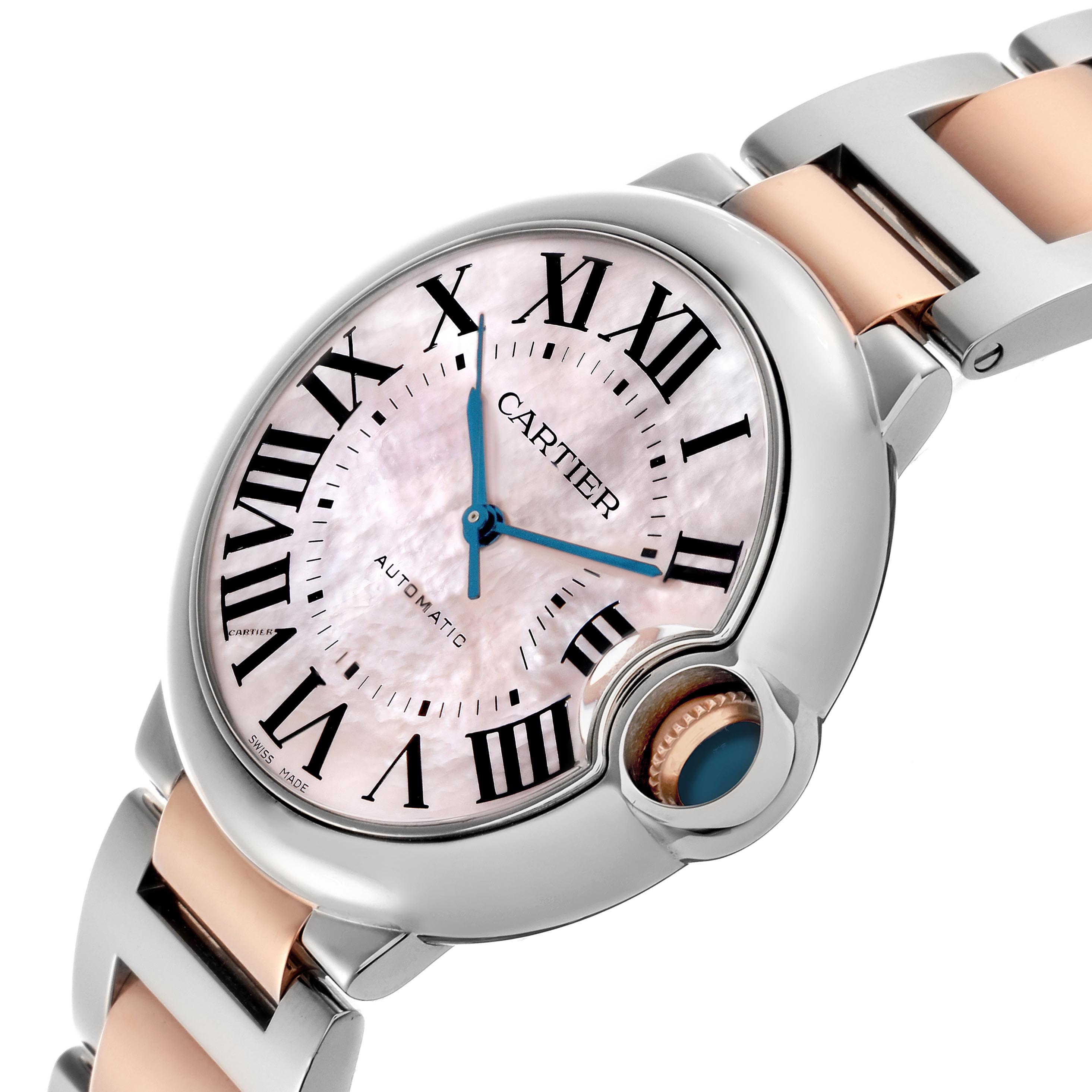 The Cartier Ballon Bleu W6920033 Women's Steel and Gold (two tone) Mother of Pearl Dial W6920033 Women's Steel and Gold (two tone) Mother of Pearl Dial watch is shown at an angle highlighting its dial, crown, and two-tone bracelet.