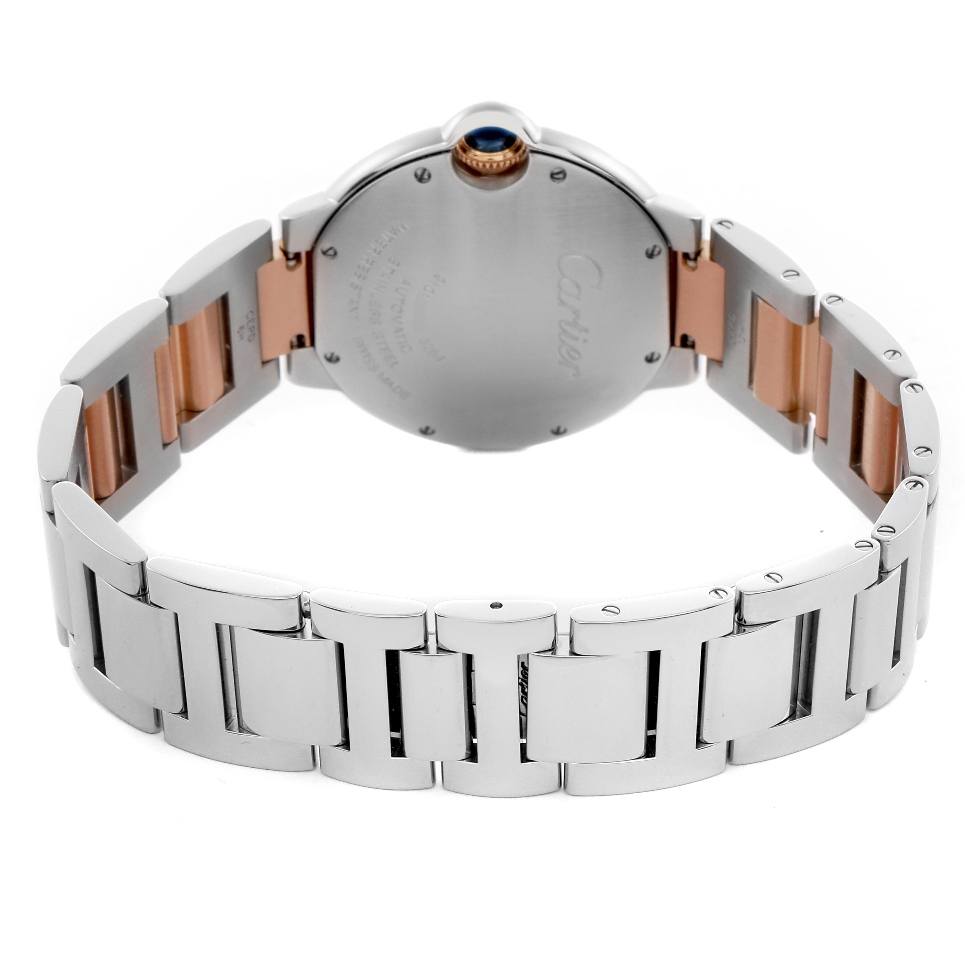 The image shows the back view of a Cartier Ballon Bleu W6920033 Women's Steel and Gold (two tone) Mother of Pearl Dial W6920033 Women's Steel and Gold (two tone) Mother of Pearl Dial watch, highlighting its stainless steel and rose gold bracelet and case back.