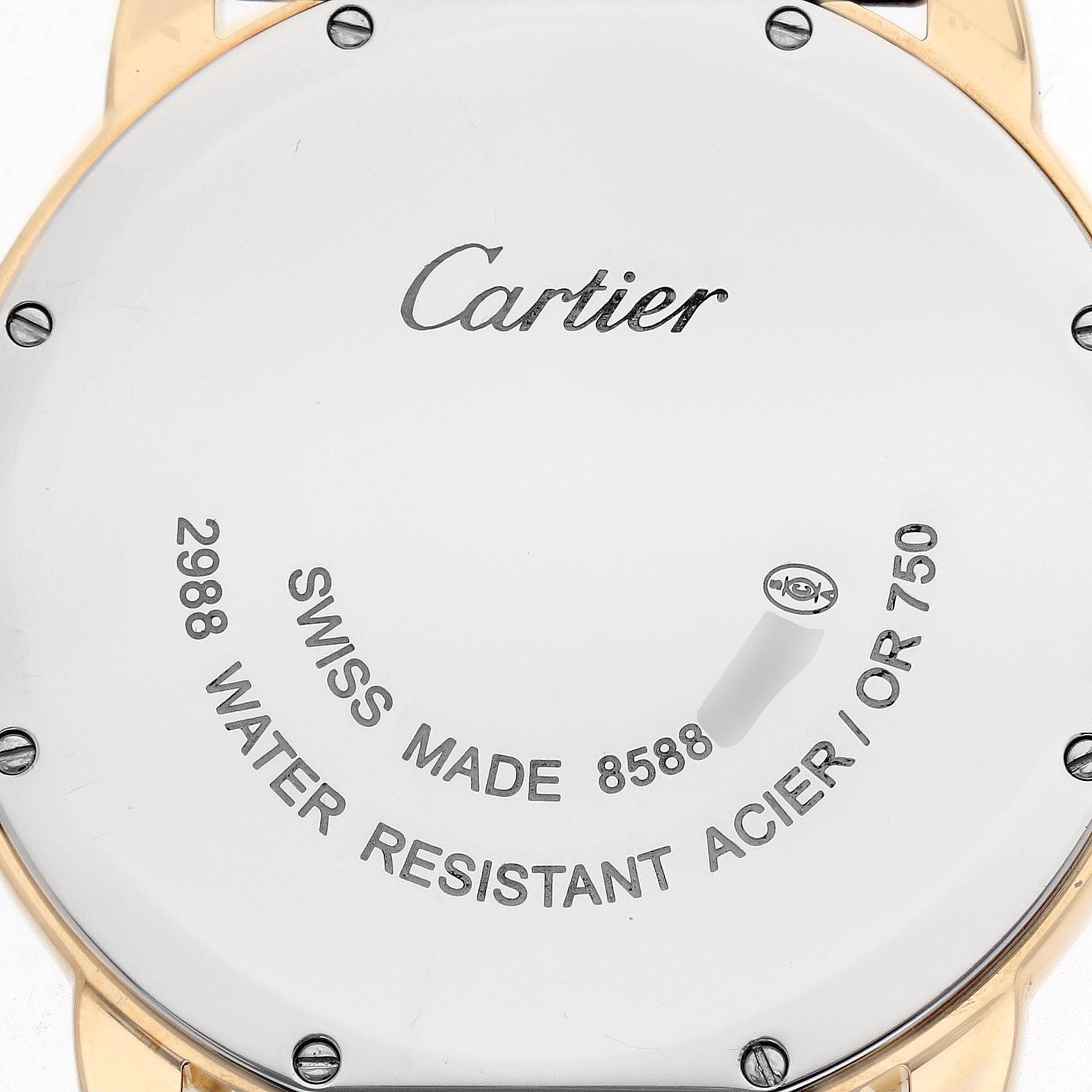 The image shows the case back of a Ronde watch by Cartier, viewed from a direct overhead angle.