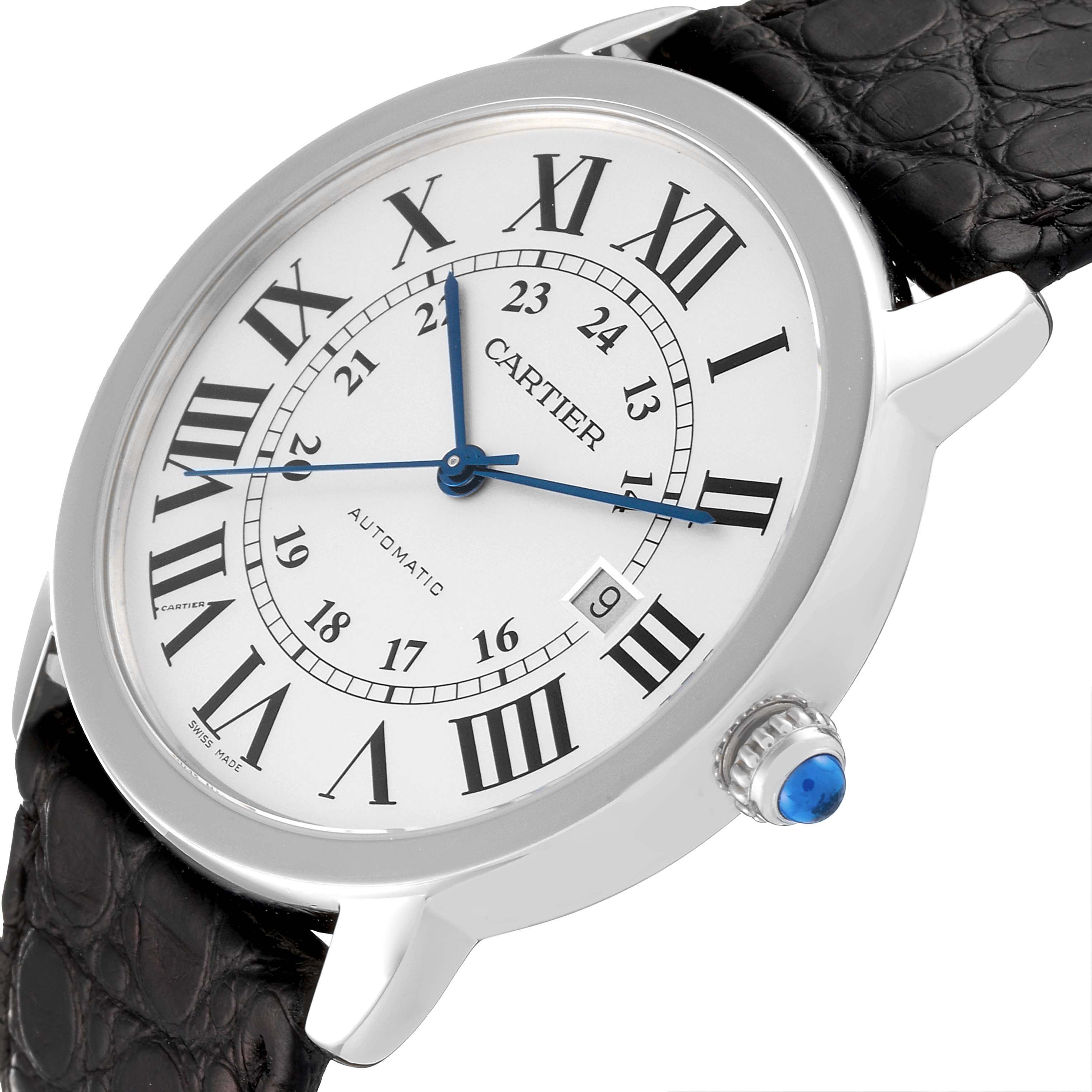 The image shows a close-up angle of the Cartier Ronde W6701010 Men
s Stainless Steel Silver Dial W6701010 Men
s Stainless Steel Silver Dial watch, highlighting its face, Roman numerals, blue hands, and black leather strap.