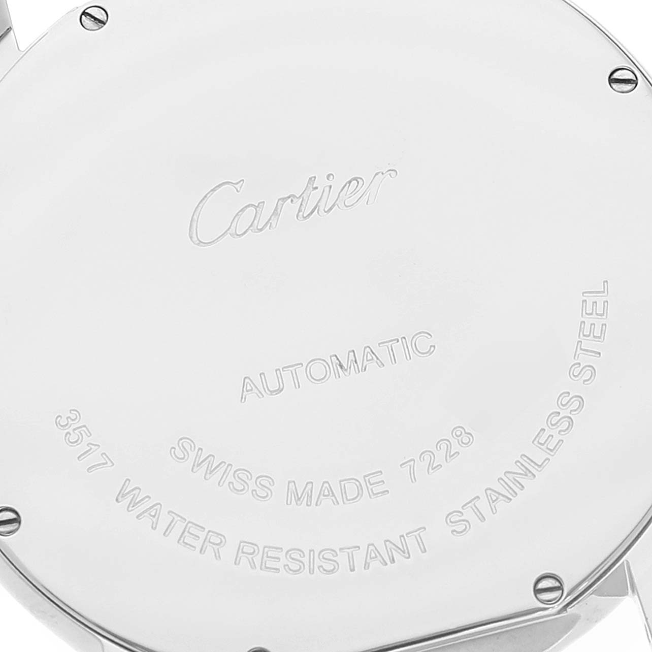 This image shows the back case of a Cartier Ronde W6701010 Men
s Stainless Steel Silver Dial W6701010 Men
s Stainless Steel Silver Dial watch with engravings.