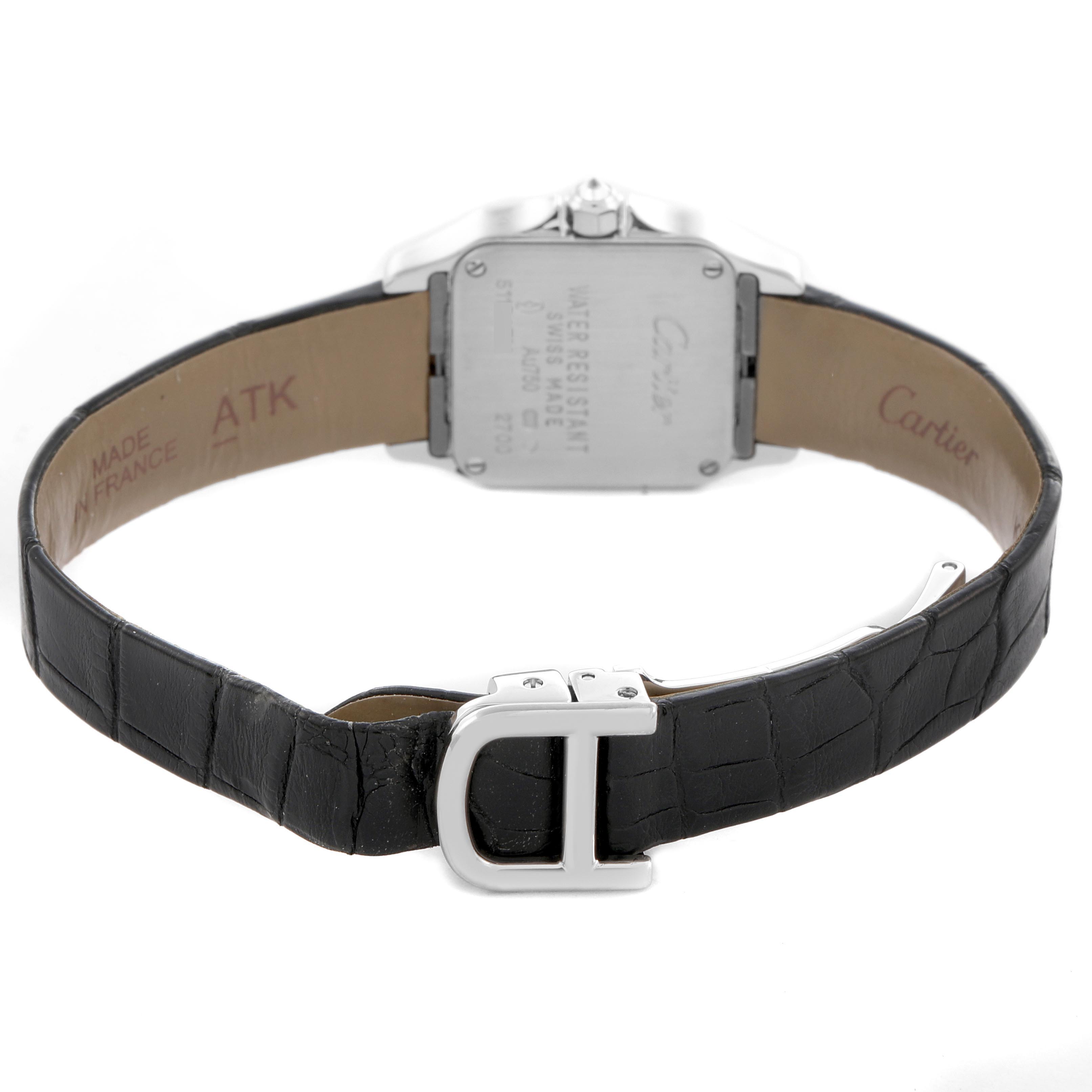 The Cartier Santos Demoiselle WF9005Y8 Women's White Gold Silver Dial WF9005Y8 Women's White Gold Silver Dial watch is shown from the back, focusing on the case back and leather strap with a buckle.