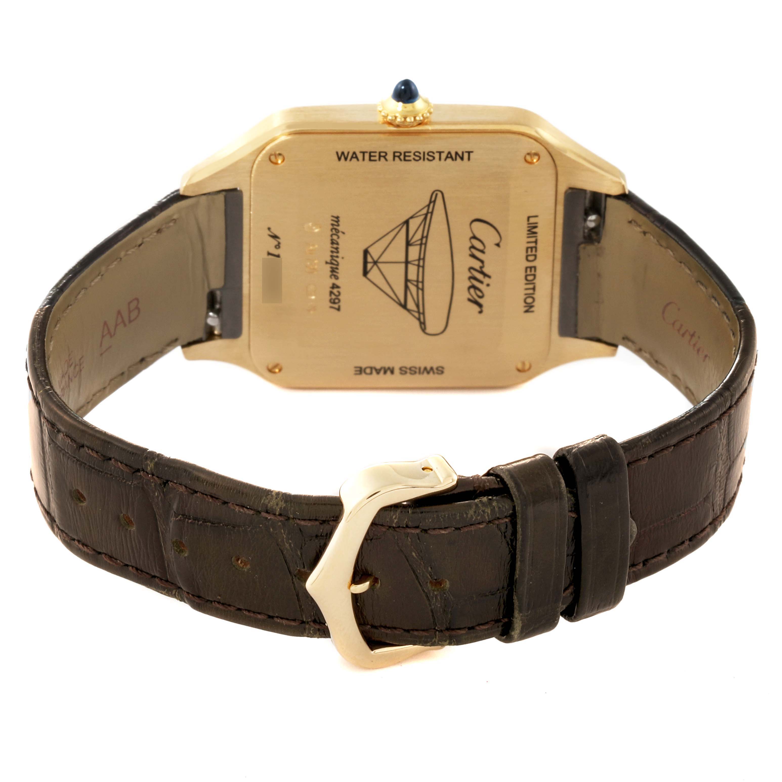 The image shows the back of a Cartier Santos Dumont WGSA0027 Men's Yellow Gold Silver Dial WGSA0027 Men's Yellow Gold Silver Dial watch, displaying the case back and leather strap with buckle.