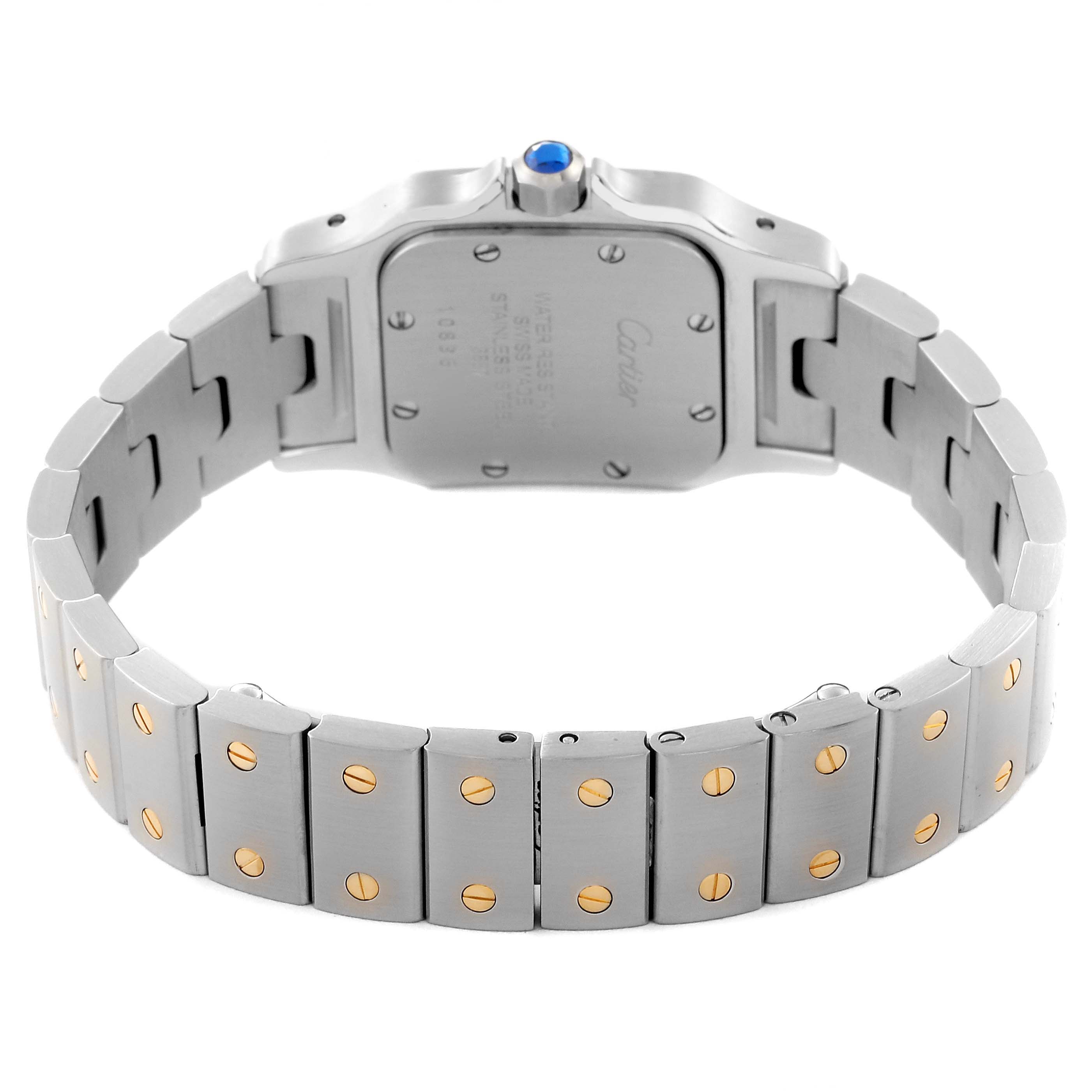 The image shows the case back and bracelet of the Cartier Santos W20012C4 Women's Steel and Gold (two tone) Silver Dial W20012C4 Women's Steel and Gold (two tone) Silver Dial watch, highlighting the two-tone metal and screws.