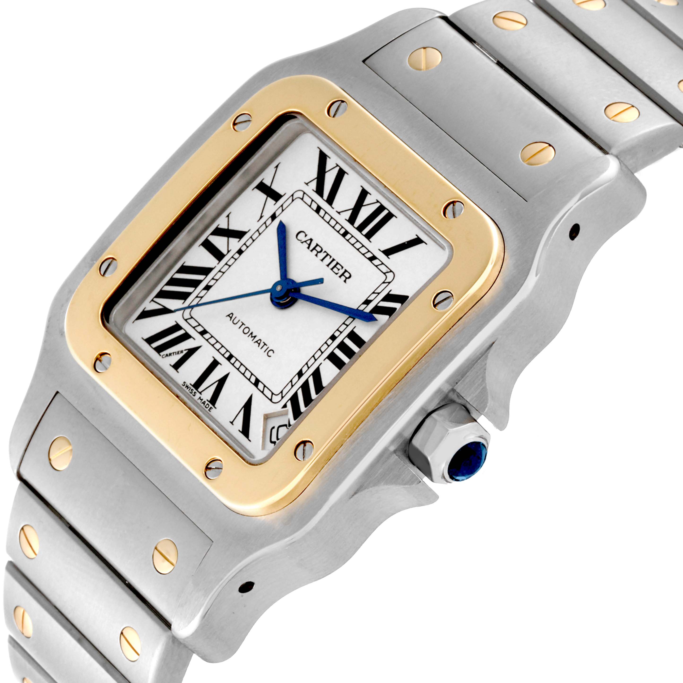 The image shows a close-up angle of the Cartier Santos W20099C4 Men
s Steel and Gold (two tone) Silver Dial W20099C4 Men
s Steel and Gold (two tone) Silver Dial watch, highlighting the dial, bezel, and part of the bracelet.