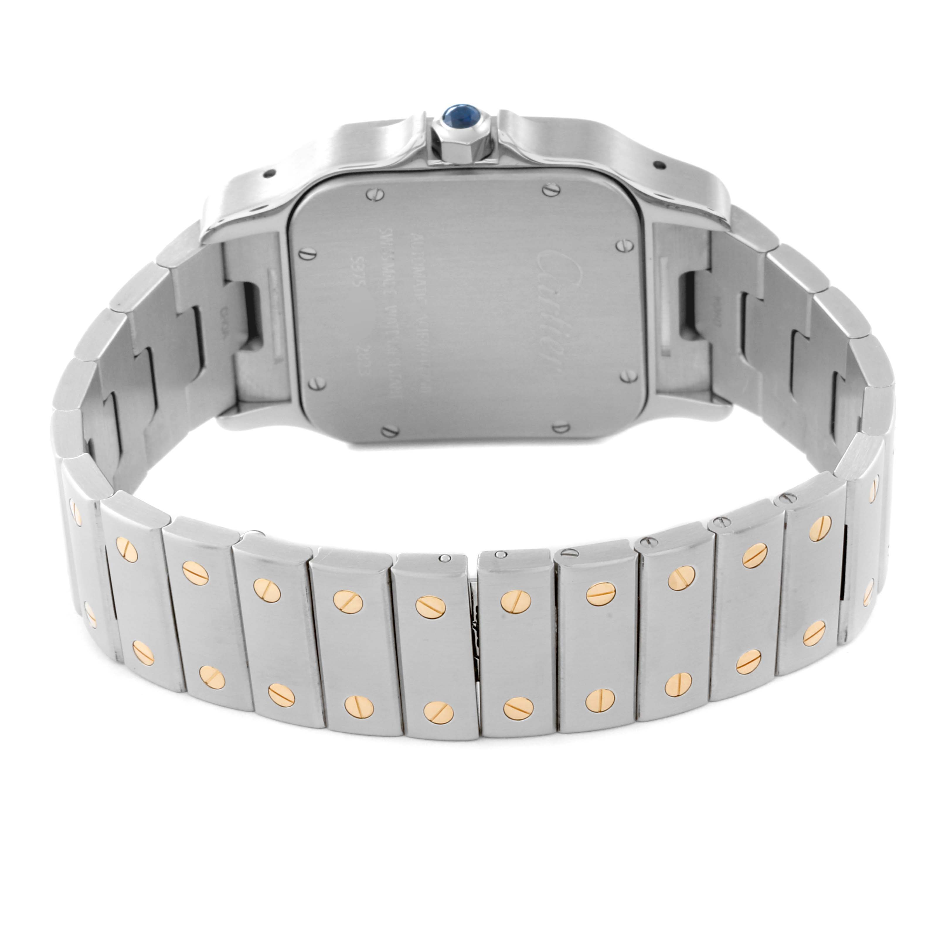 This image shows the back case and bracelet of a Santos model by Cartier, highlighting its stainless steel and gold screw accents.