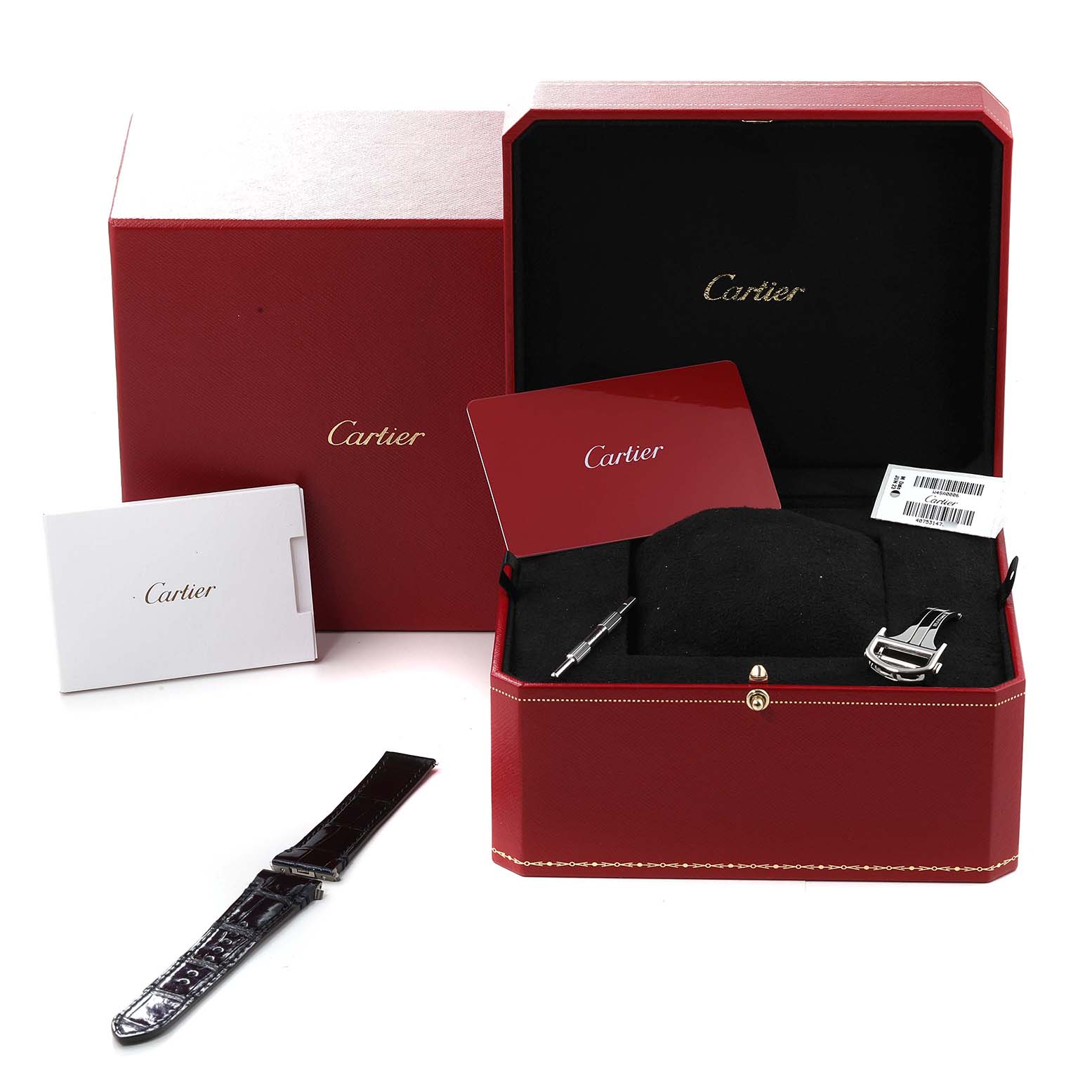 The image shows the Cartier Santos W4SA0006 Men
s Stainless Steel Blue Dial W4SA0006 Men
s Stainless Steel Blue Dial watch box, documentation, and an extra leather strap from a front angle.