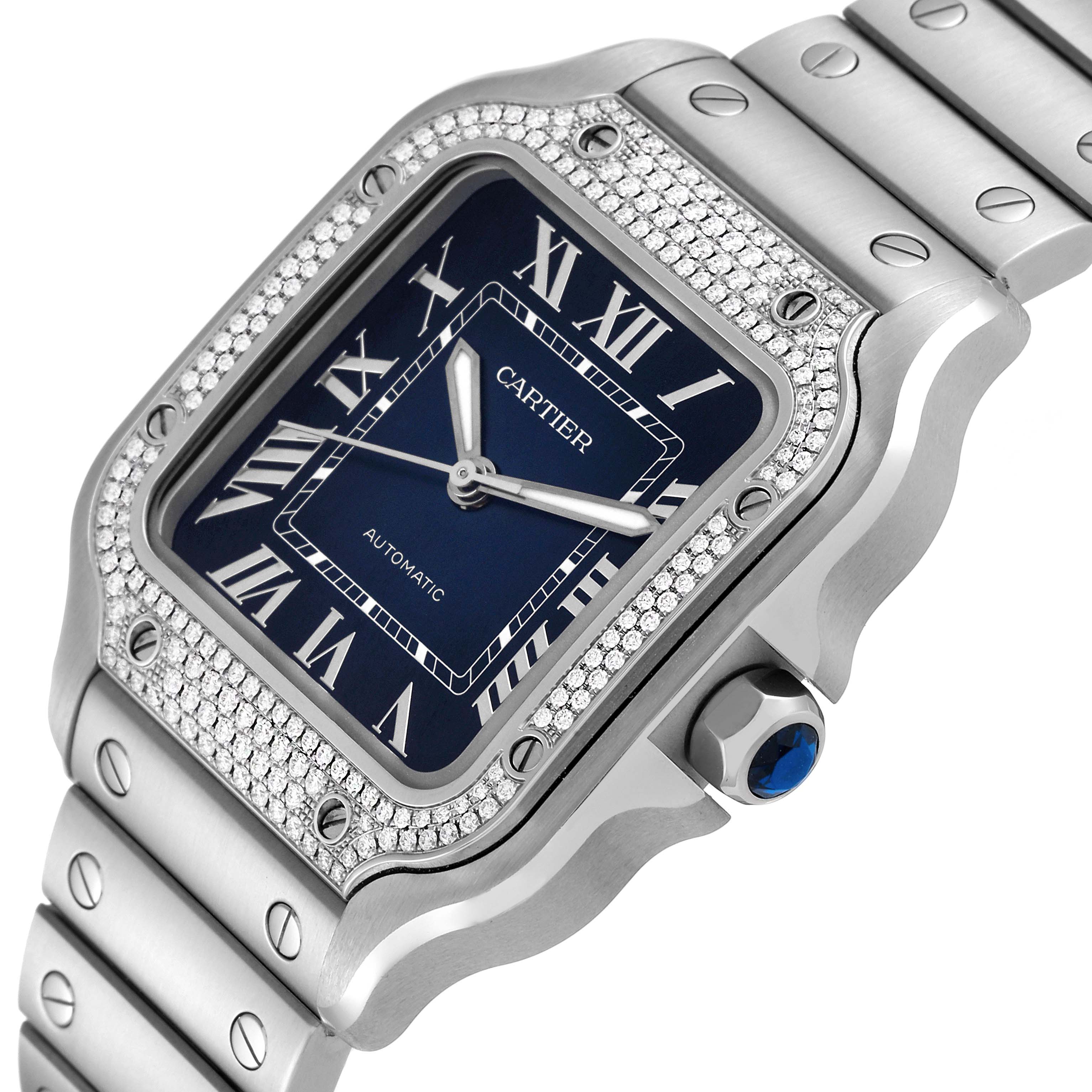 This image shows a close-up of the face and bezel of the Cartier Santos W4SA0006 Men
s Stainless Steel Blue Dial W4SA0006 Men
s Stainless Steel Blue Dial watch, highlighting its blue dial and diamond-encrusted bezel.