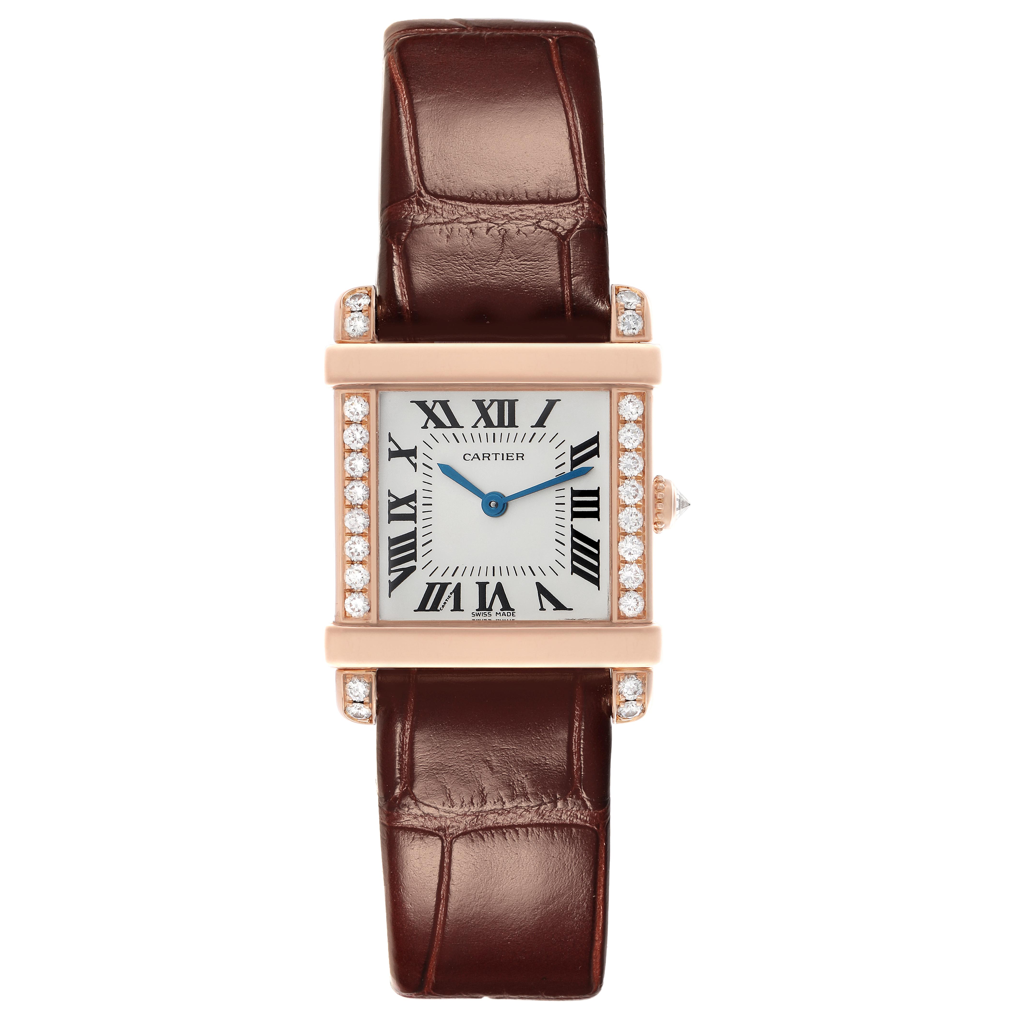 The Cartier Tank Louis WE300131 Women's Rose Gold Silver Dial WE300131 Women's Rose Gold Silver Dial watch is shown from the front, highlighting its rectangular case, diamond accents, and brown leather strap.
