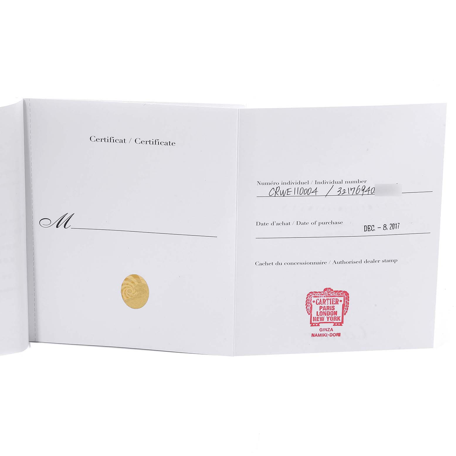 The image shows the warranty certificate for the Tank Francaise model by Cartier, opened to display the individual number and purchase details.