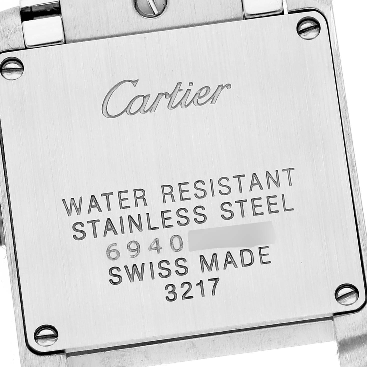 This image shows the case back of the Cartier Tank Francaise WE110004 Women's Steel and Gold (two tone) Silver Dial WE110004 Women's Steel and Gold (two tone) Silver Dial watch, highlighting its water resistance and stainless steel construction. 