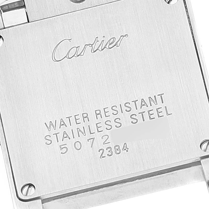 This image shows the back case of a Cartier Tank Francaise W51027Q4 Women's Steel and Gold (two tone) Mother of Pearl Dial W51027Q4 Women's Steel and Gold (two tone) Mother of Pearl Dial watch, highlighting the brand name and water resistance details.