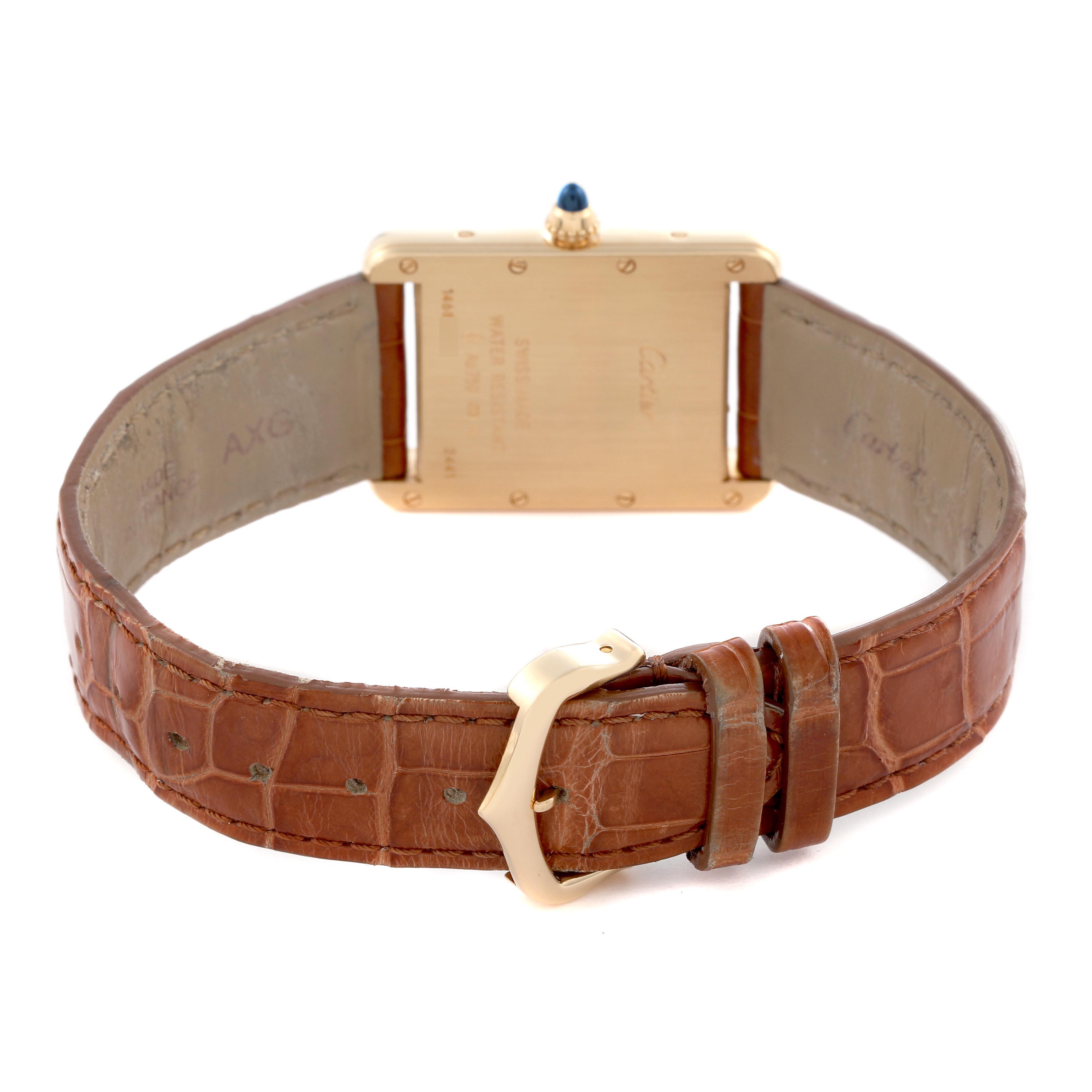 The image shows the back of the Cartier Tank Louis W1529756 Men's Yellow Gold Silver Dial W1529756 Men's Yellow Gold Silver Dial watch, featuring the case back, buckle, and brown leather strap.