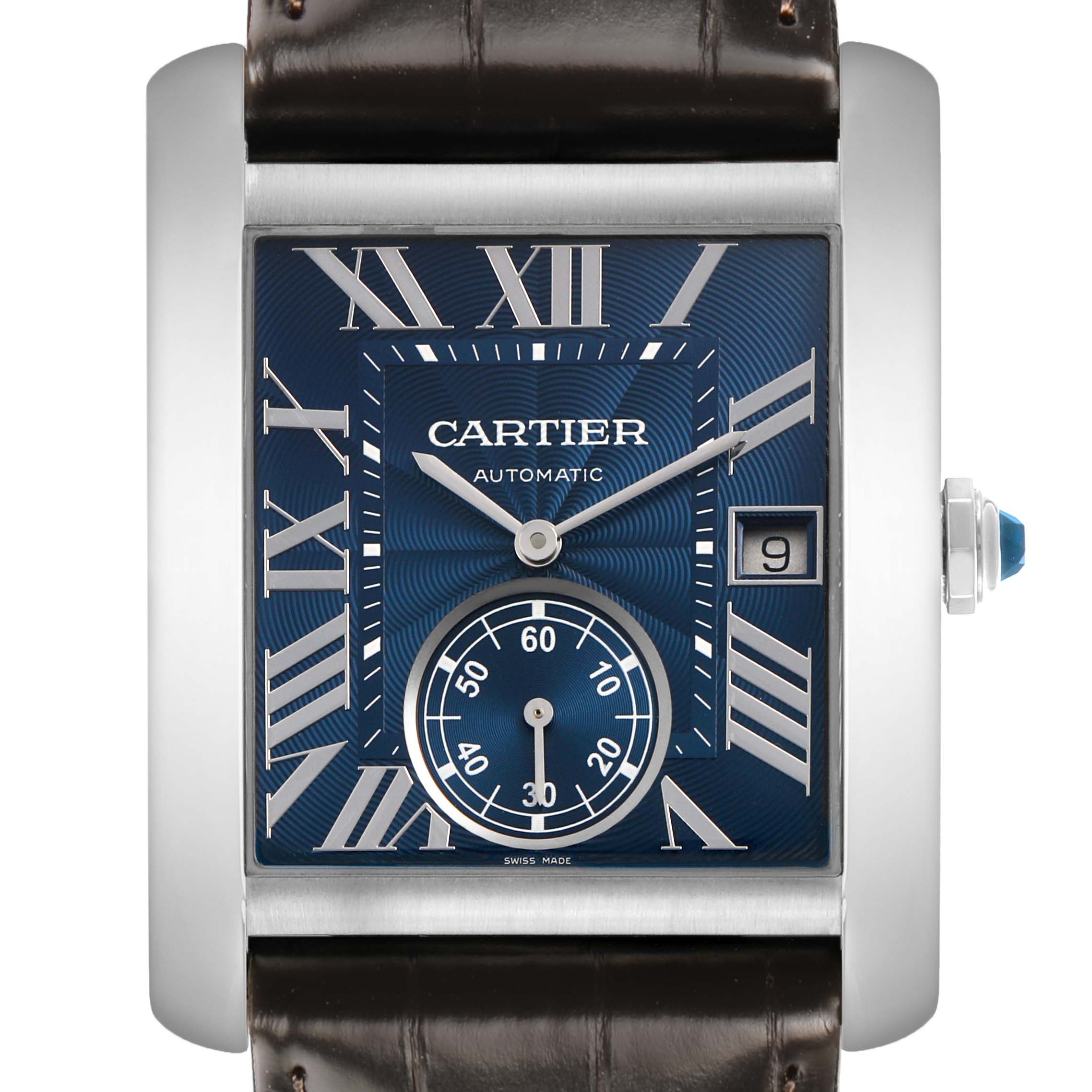 The Cartier Tank MC WSTA0010 Men's Stainless Steel Blue Dial watch is shown from a front view, highlighting the dial, crown, and part of the leather strap.
