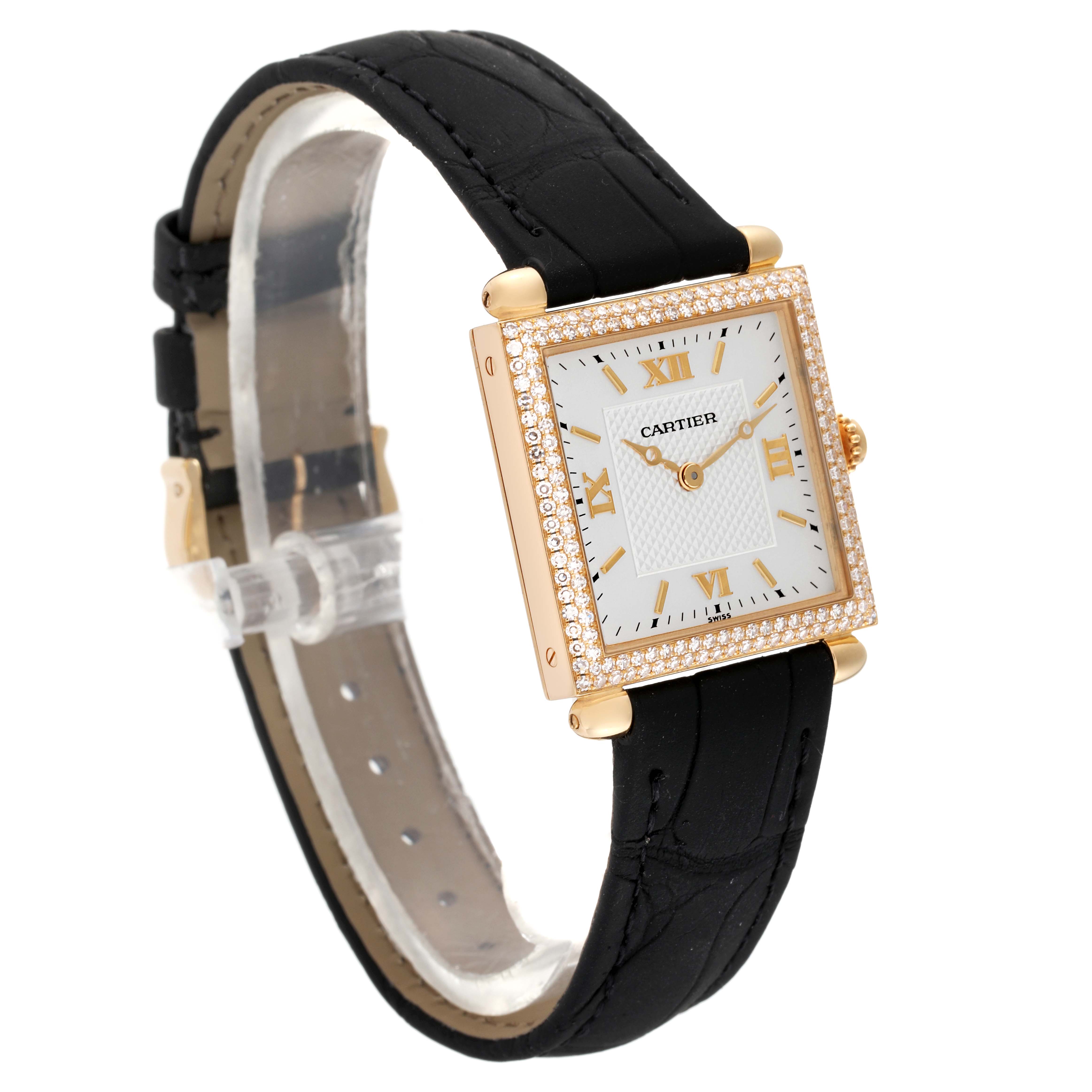 The image shows a Cartier Tank Obus WB800351 Women's Yellow Gold Silver Dial WB800351 Women's Yellow Gold Silver Dial watch at a three-quarter angle, featuring a square, diamond-encrusted case and black leather strap.