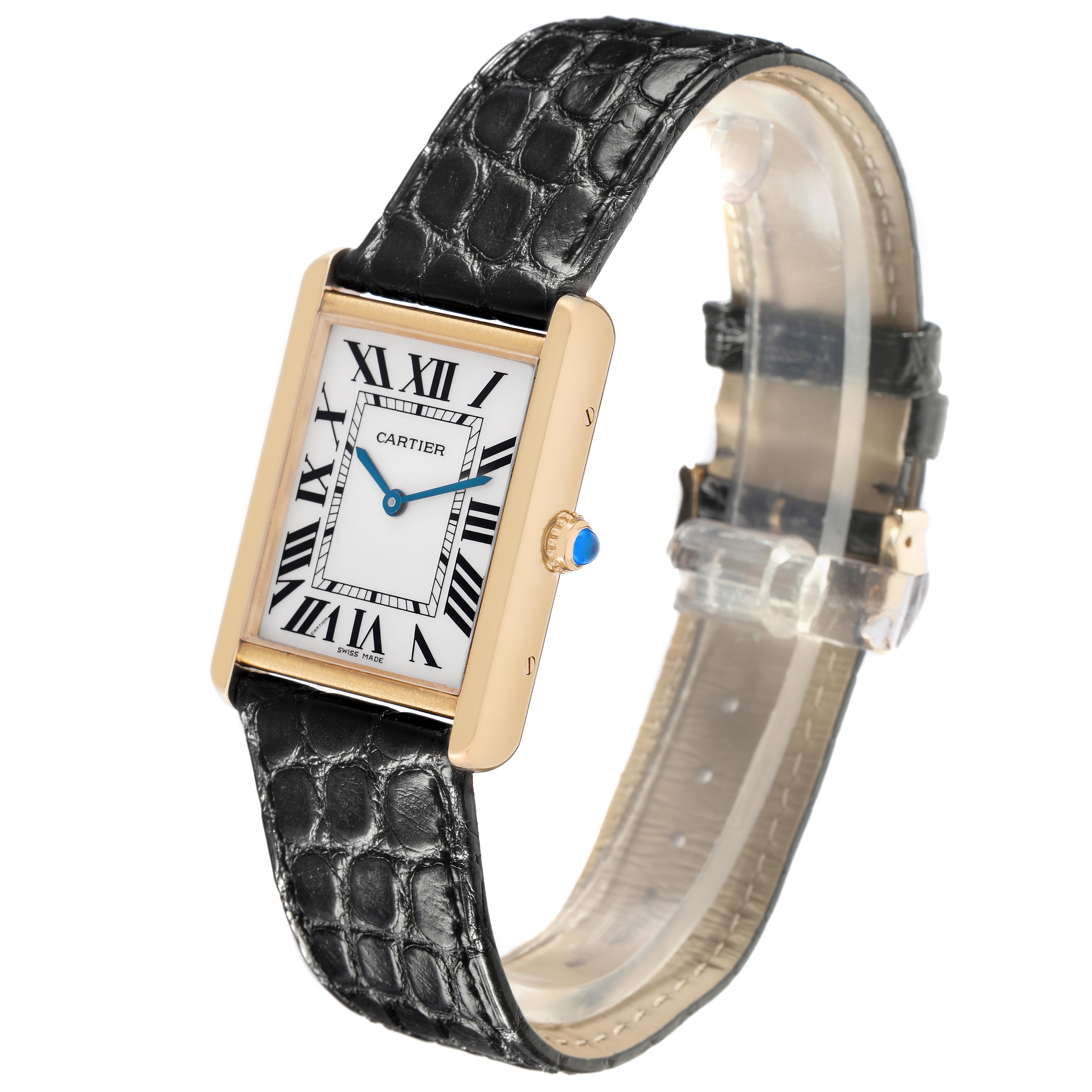 The Cartier Tank Solo W5200004 Men's Steel and Gold (two tone) Silver Dial W5200004 Men's Steel and Gold (two tone) Silver Dial watch is shown at a three-quarter angle, highlighting the face, roman numerals, crown, and black leather strap.