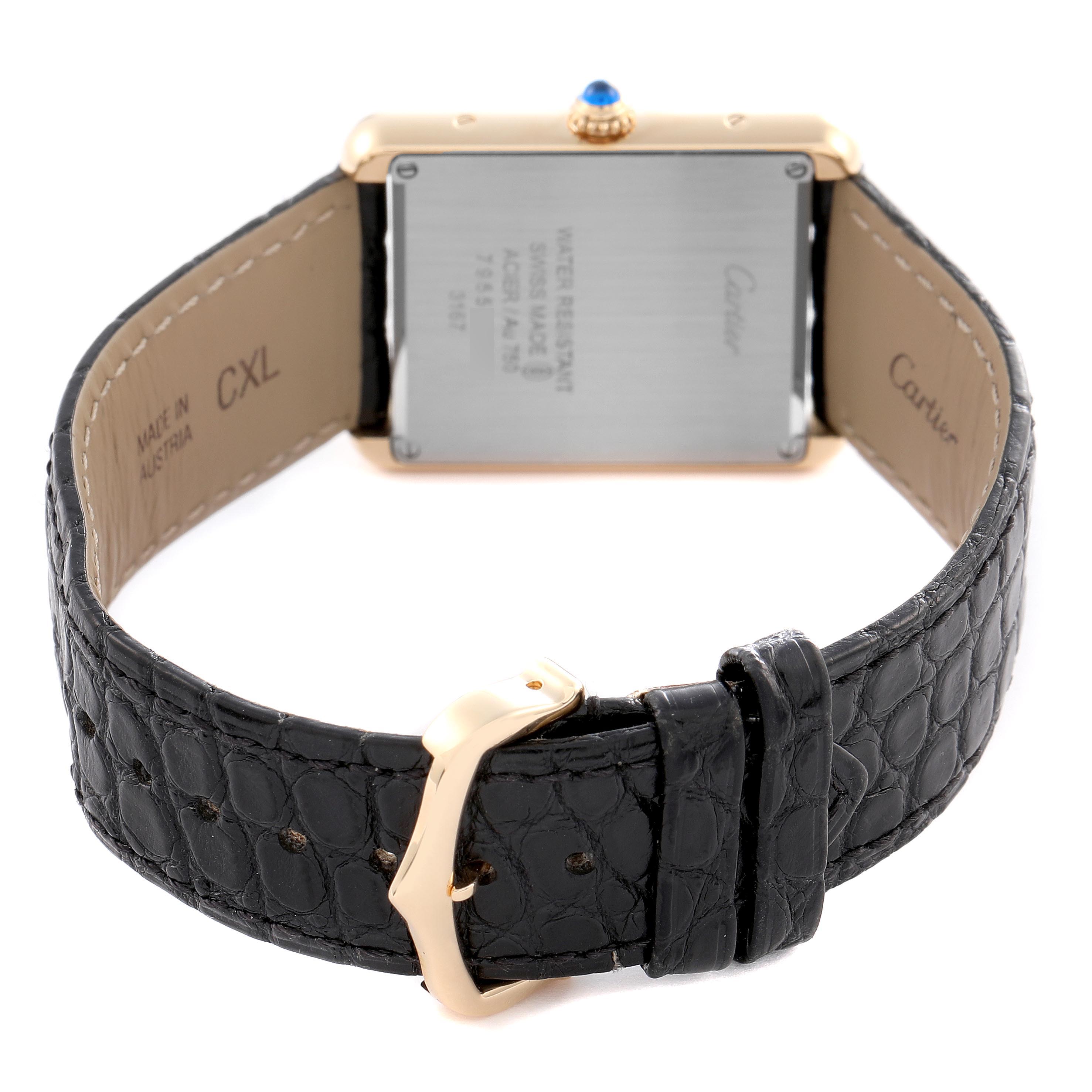 The Cartier Tank Solo W5200004 Men's Steel and Gold (two tone) Silver Dial W5200004 Men's Steel and Gold (two tone) Silver Dial watch is shown from the back, highlighting its case back, strap, and buckle.